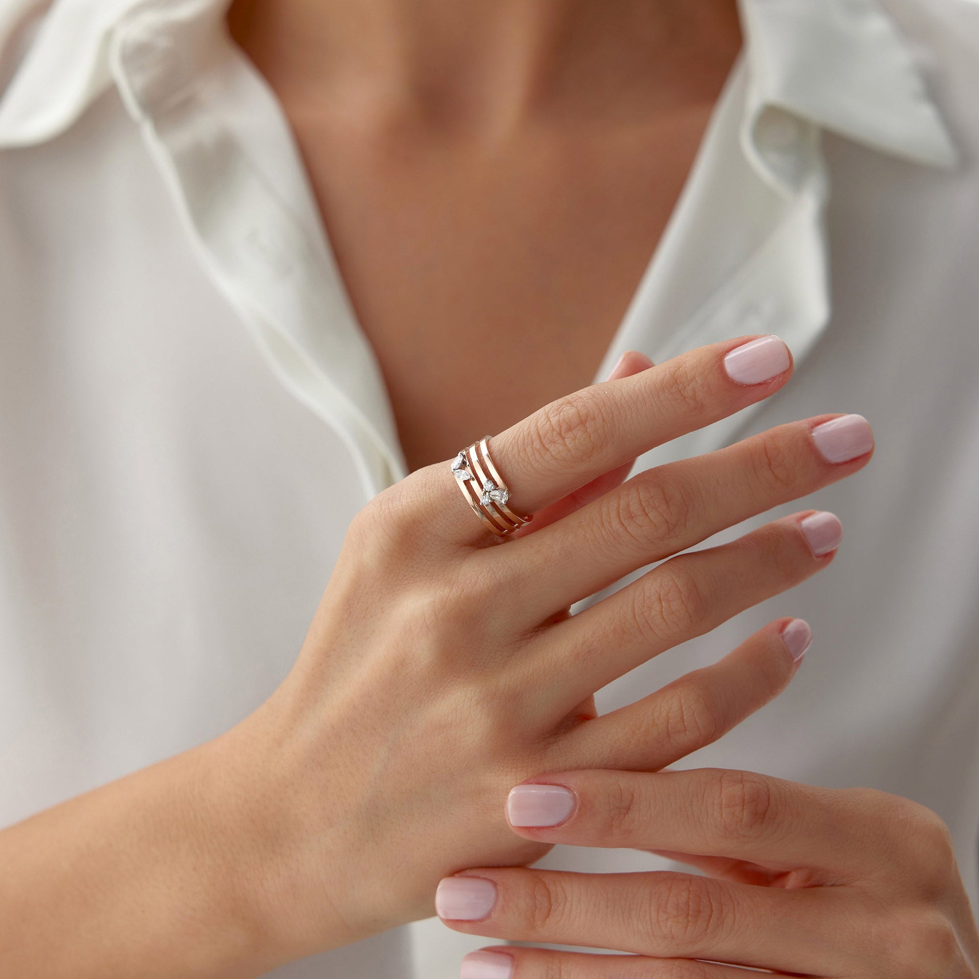 Elegant Diamond Swirl Ring in 14K Gold