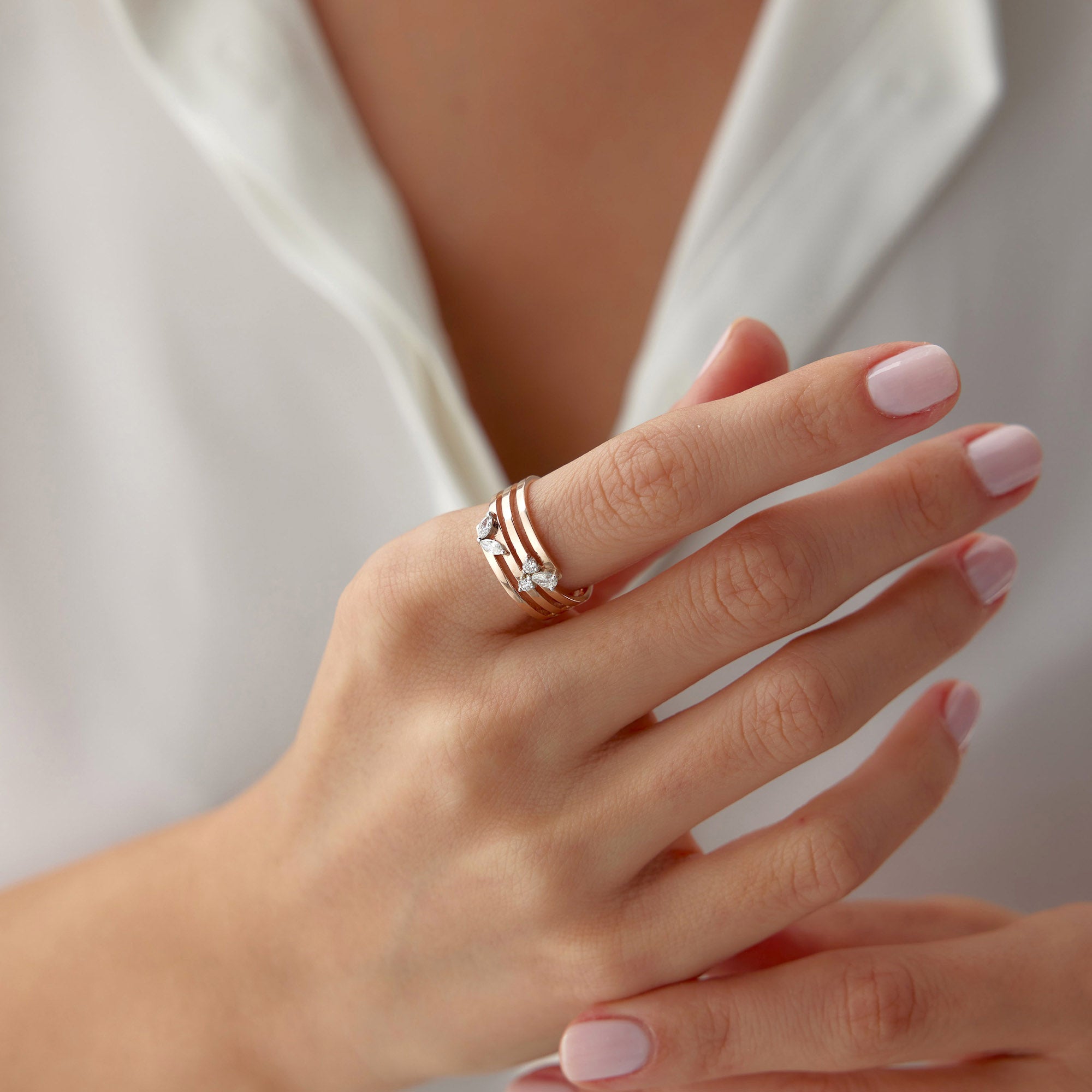 Elegant Diamond Swirl Ring in 14K Gold