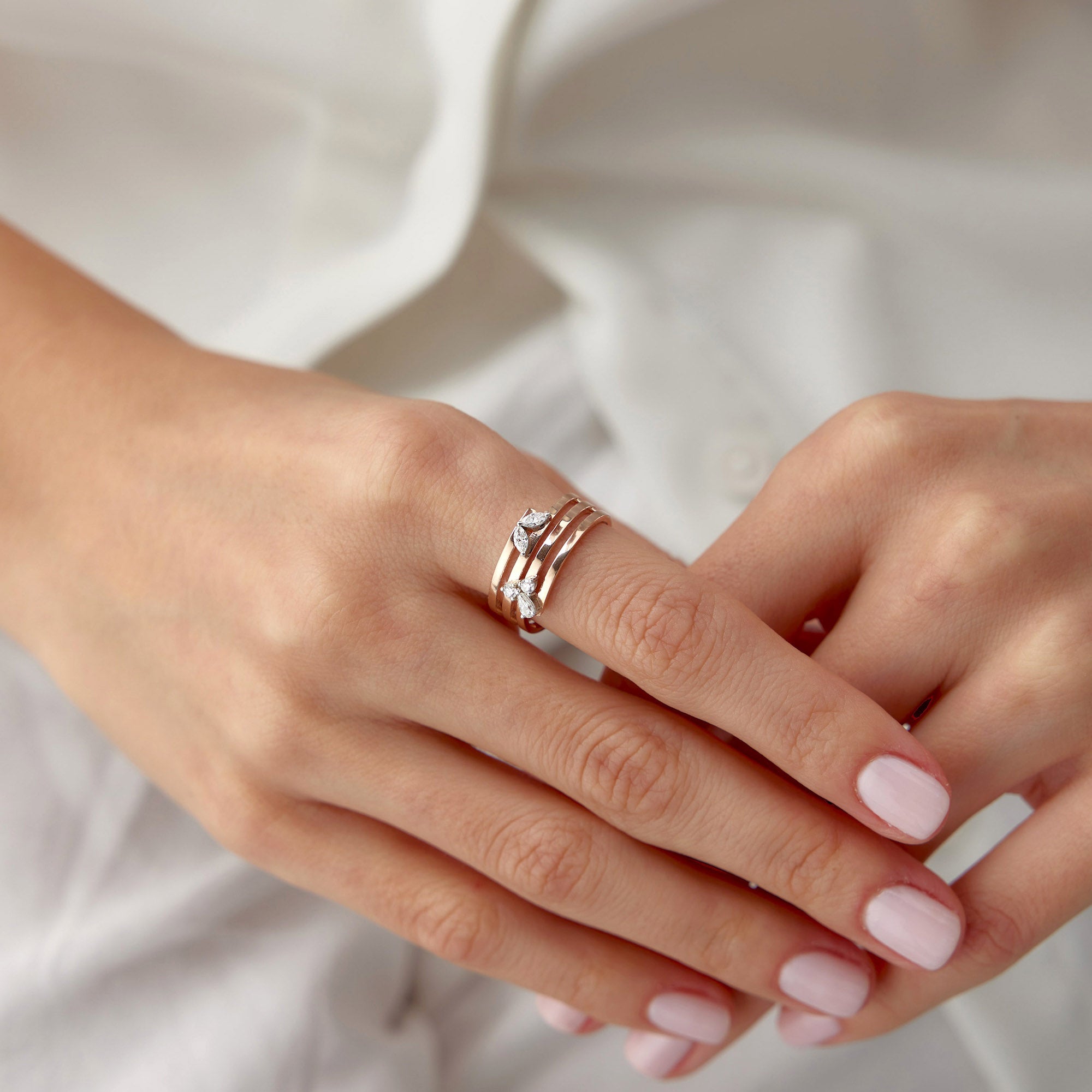 Elegant Diamond Swirl Ring in 14K Gold