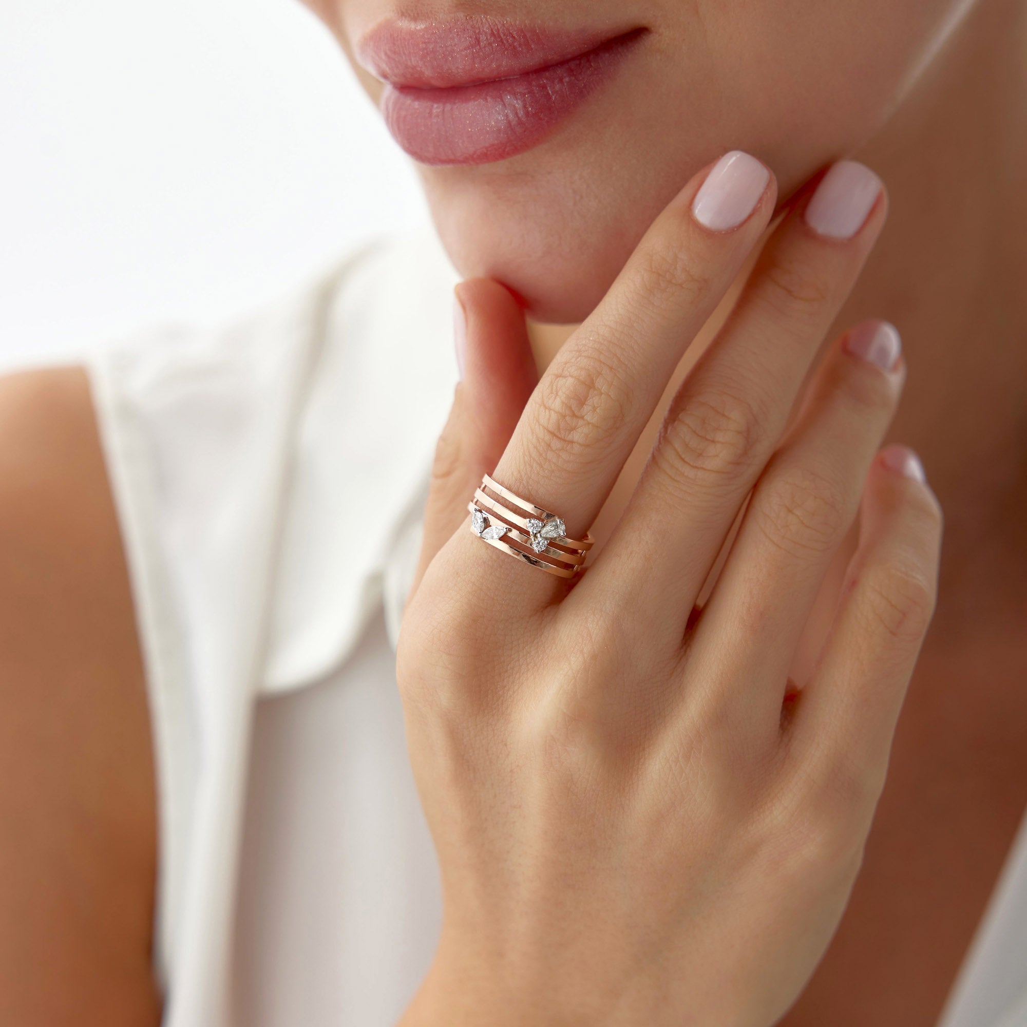 Elegant Diamond Swirl Ring in 14K Gold