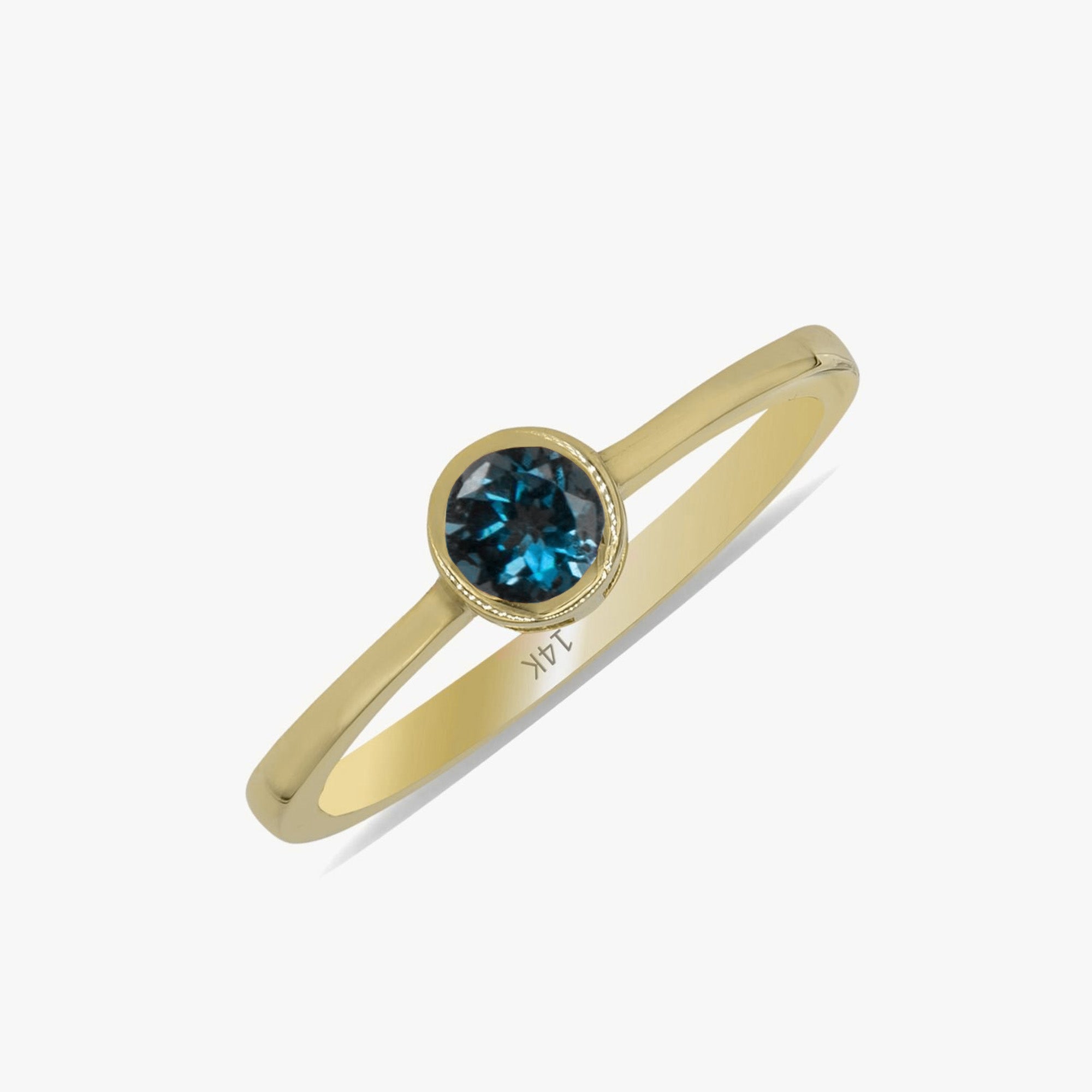 Bezel Set Blue Topaz Ring in 14K Gold
