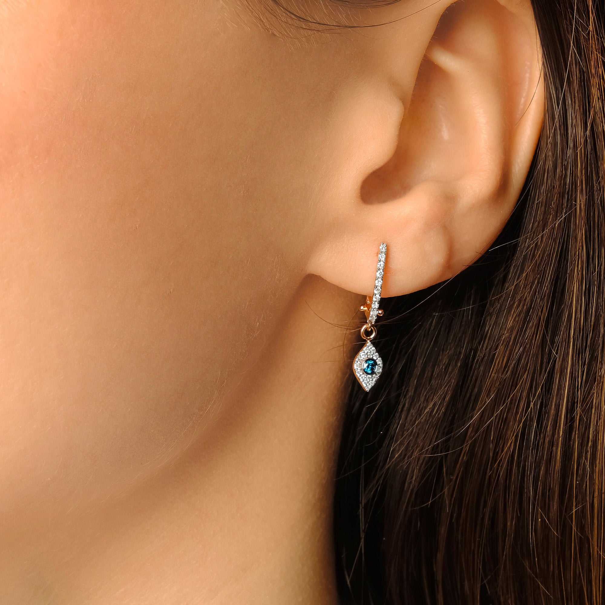 Blue and White Diamond Evil Eye Huggies in 14K Gold