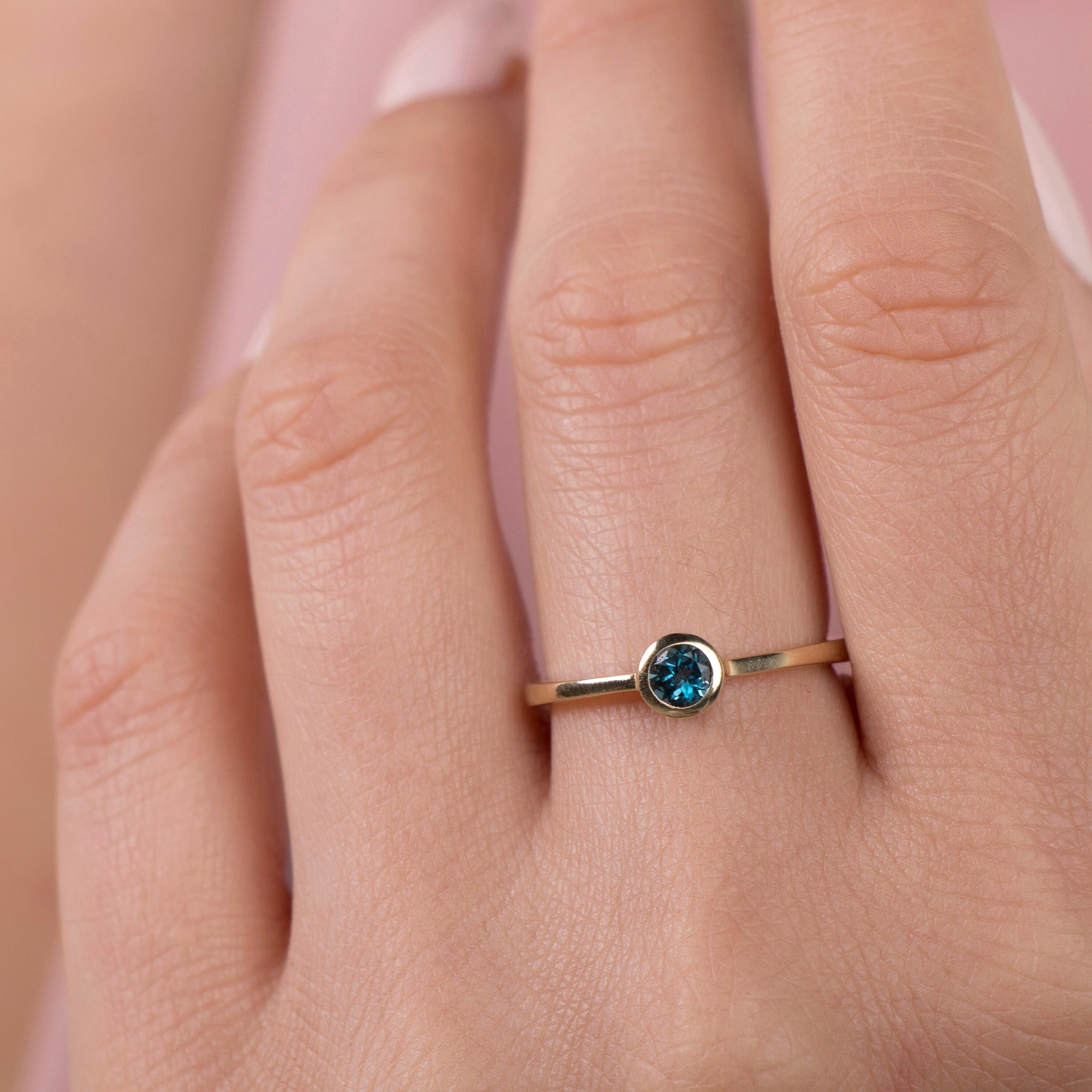 Bezel Set Blue Topaz Ring in 14K Gold