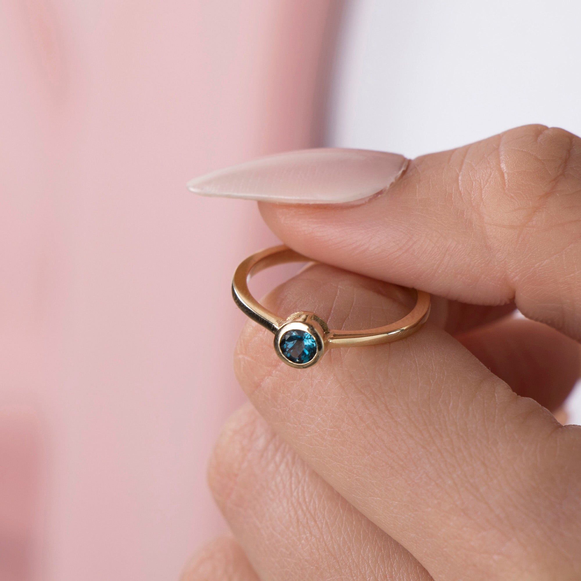 Bezel Set Blue Topaz Ring in 14K Gold