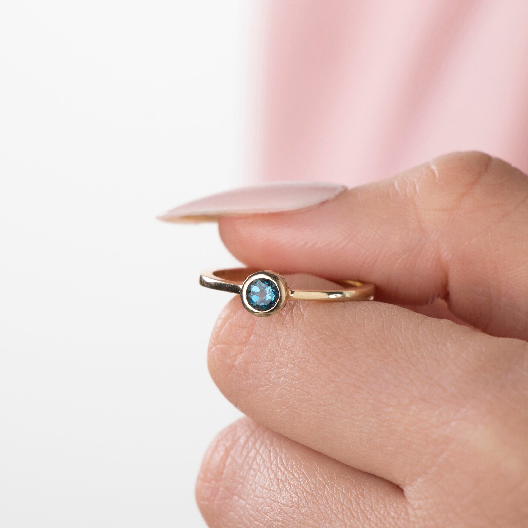 Bezel Set Blue Topaz Ring in 14K Gold