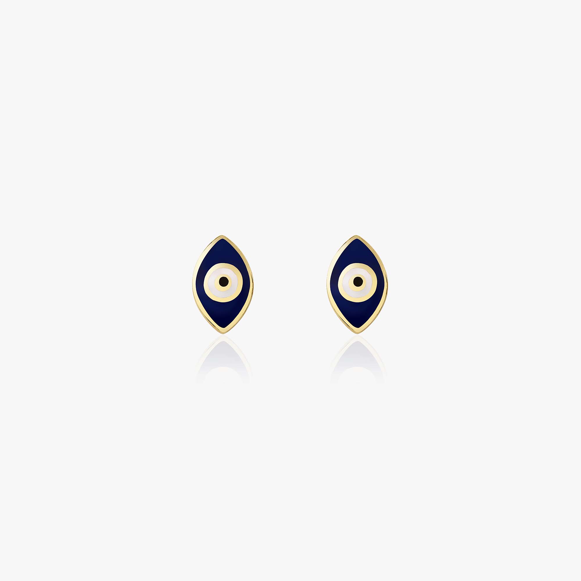 A pair of 14k yellow gold chubby evil eye studs on a white background.
