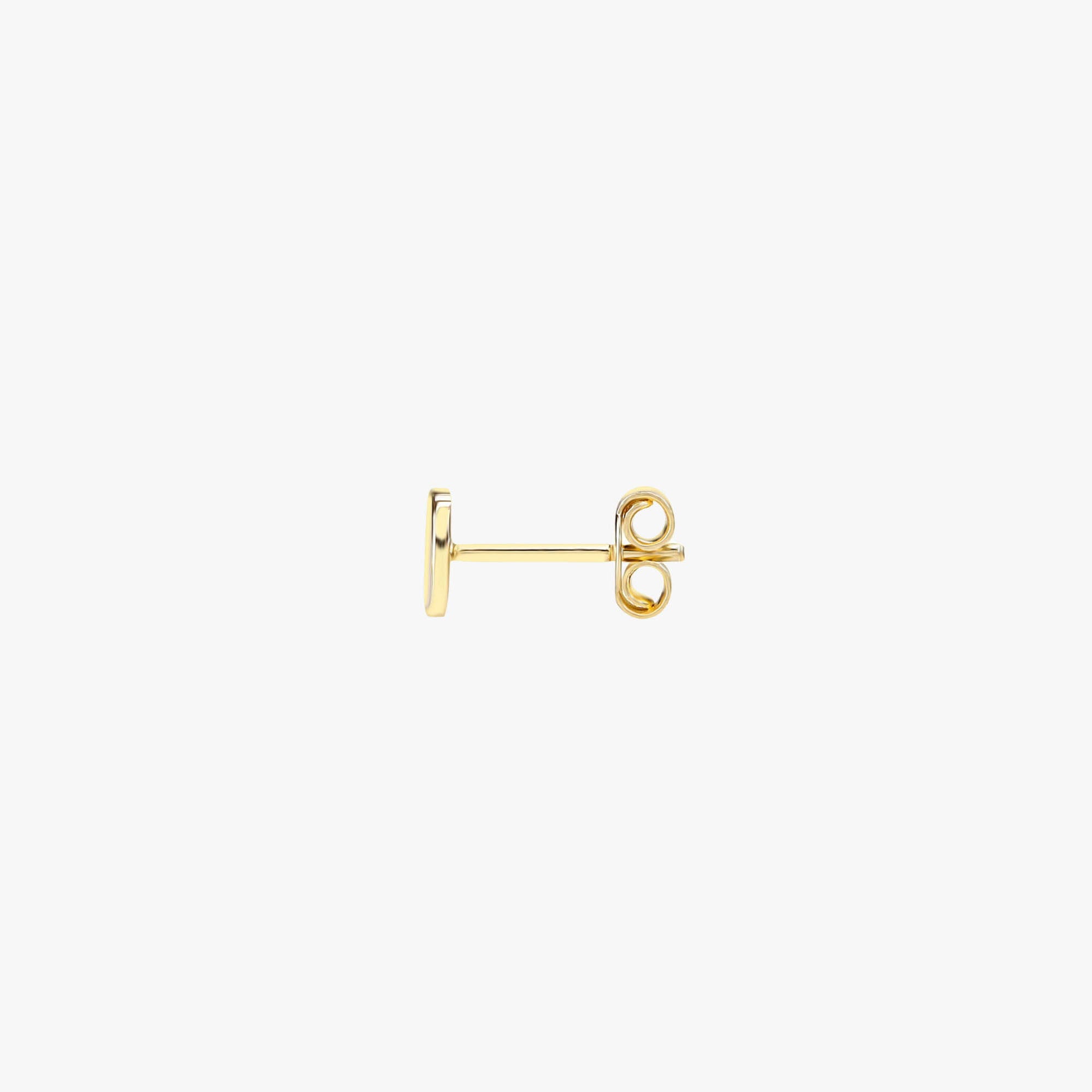Sideview of a 14k yellow gold circle stud