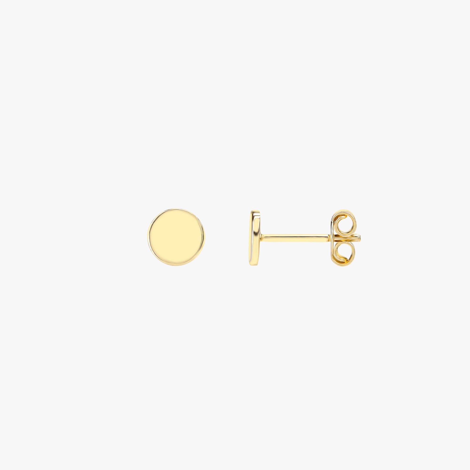 Sideview of a mini circle stud on a white background