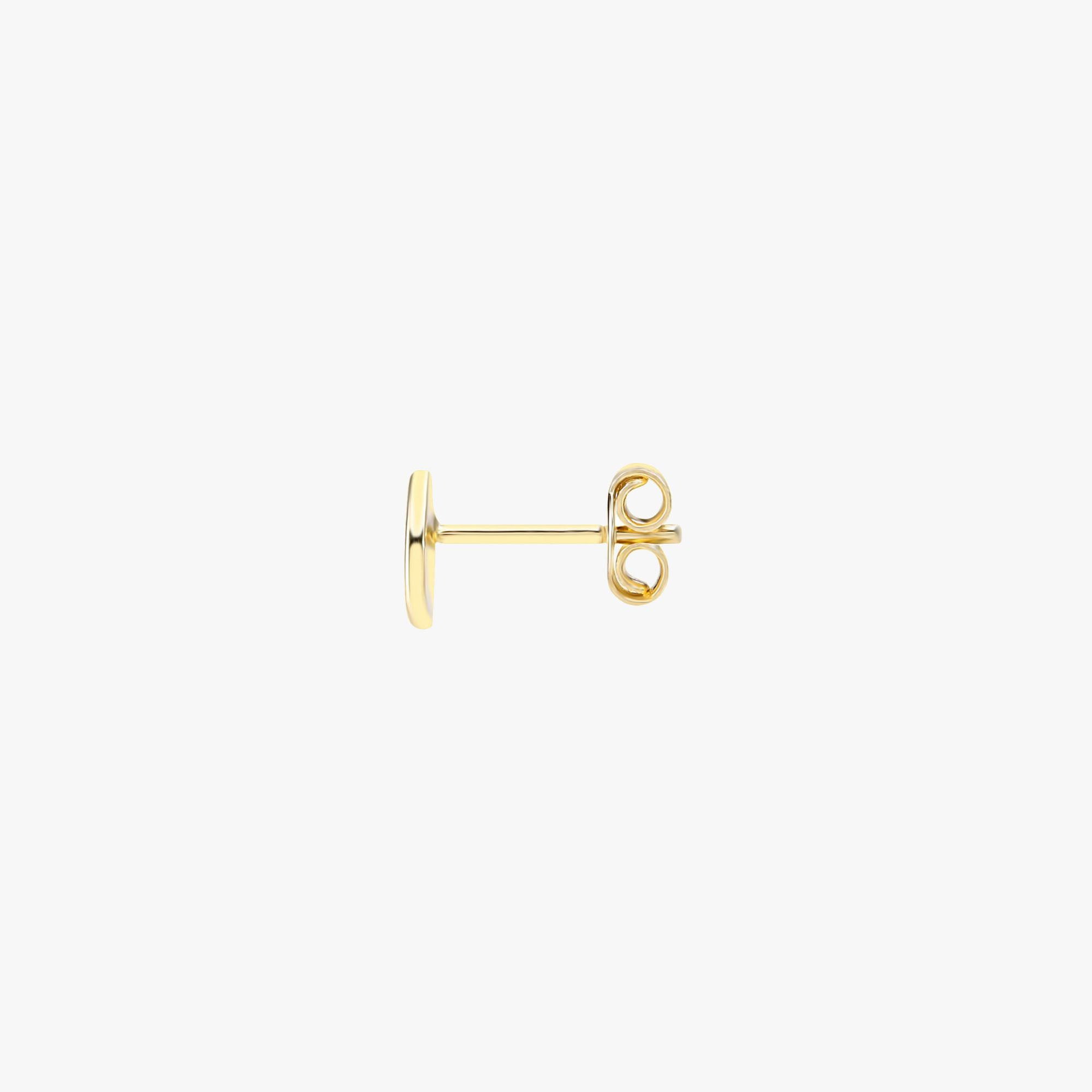 Sideview of a mini raindrop stud earring on a white background