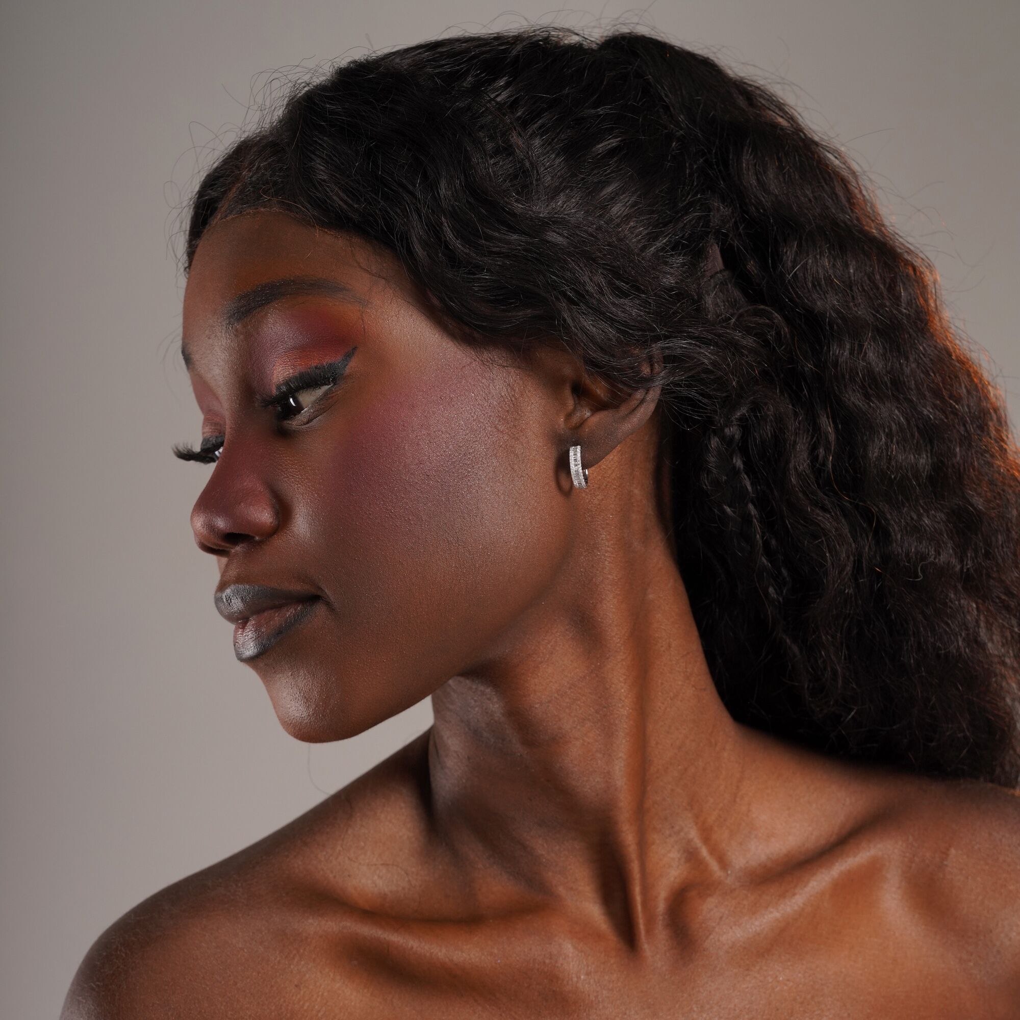 Baguette Diamond Huggie Hoops in 18K Gold