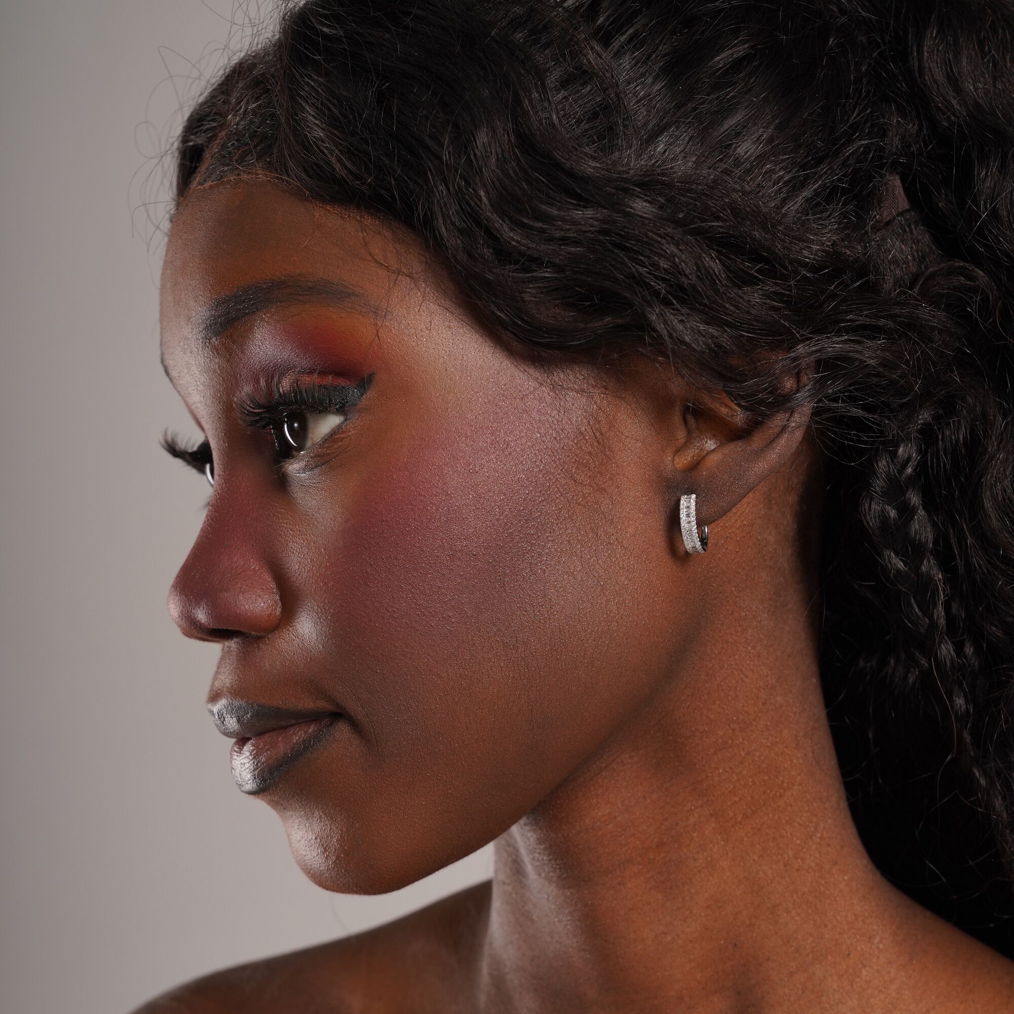 Baguette Diamond Huggie Hoops in 18K Gold