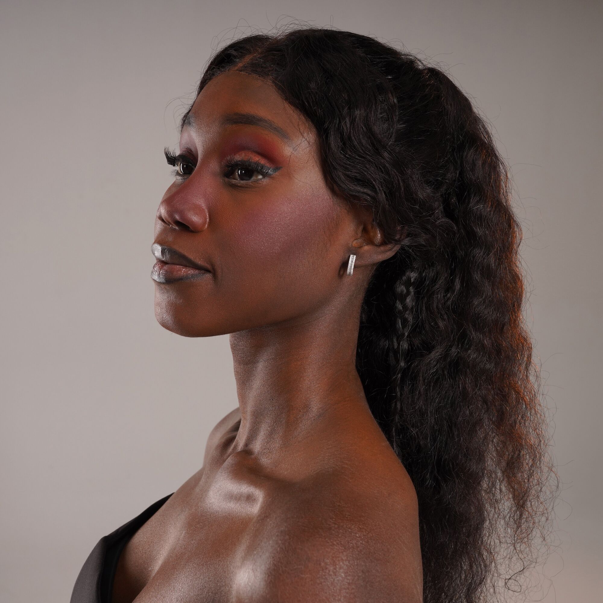 Baguette Diamond Huggie Hoops in 18K Gold