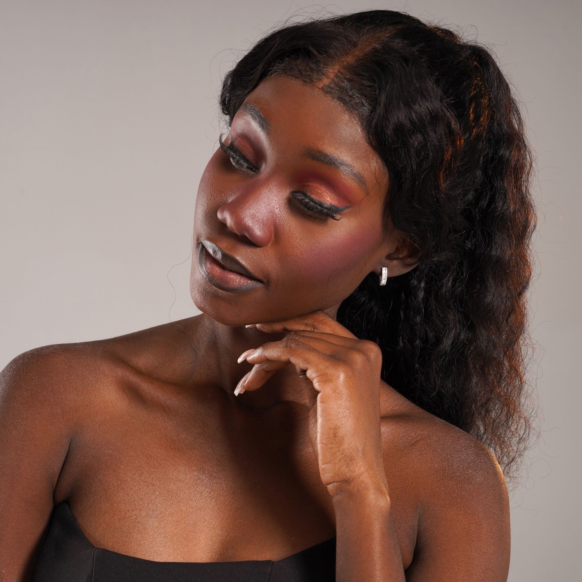 Baguette Diamond Huggie Hoops in 18K Gold