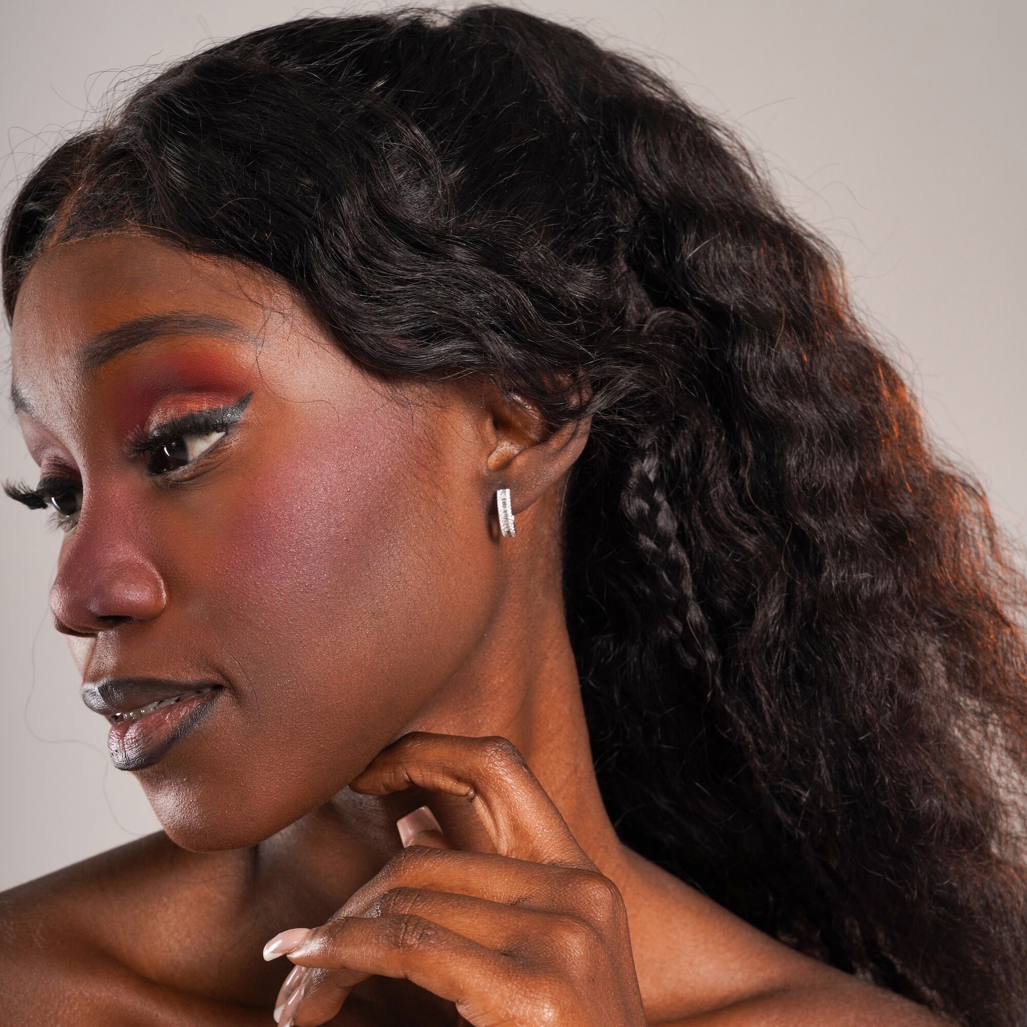 Baguette Diamond Huggie Hoops in 18K Gold