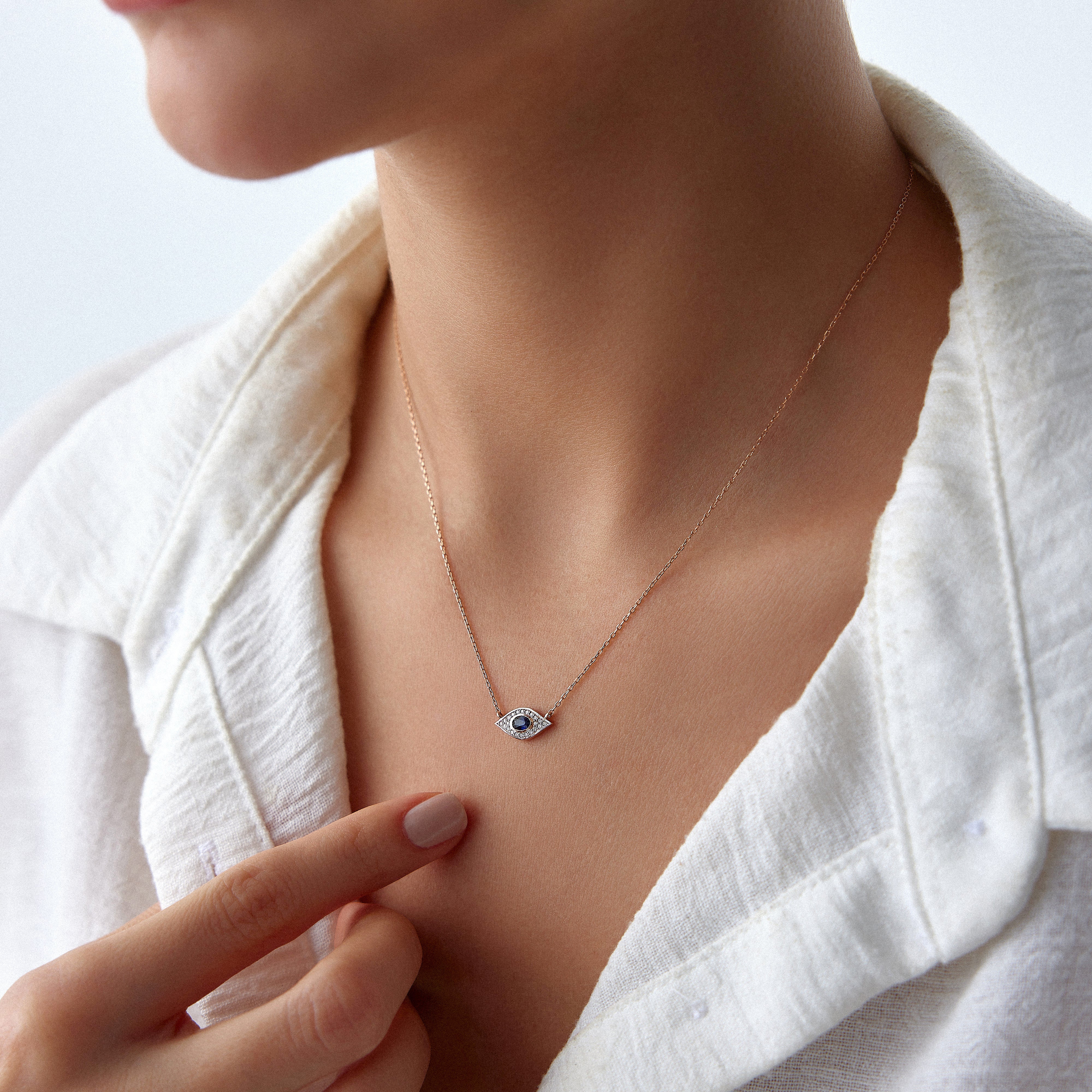 Blue Sapphire and Diamond Evil Eye Necklace