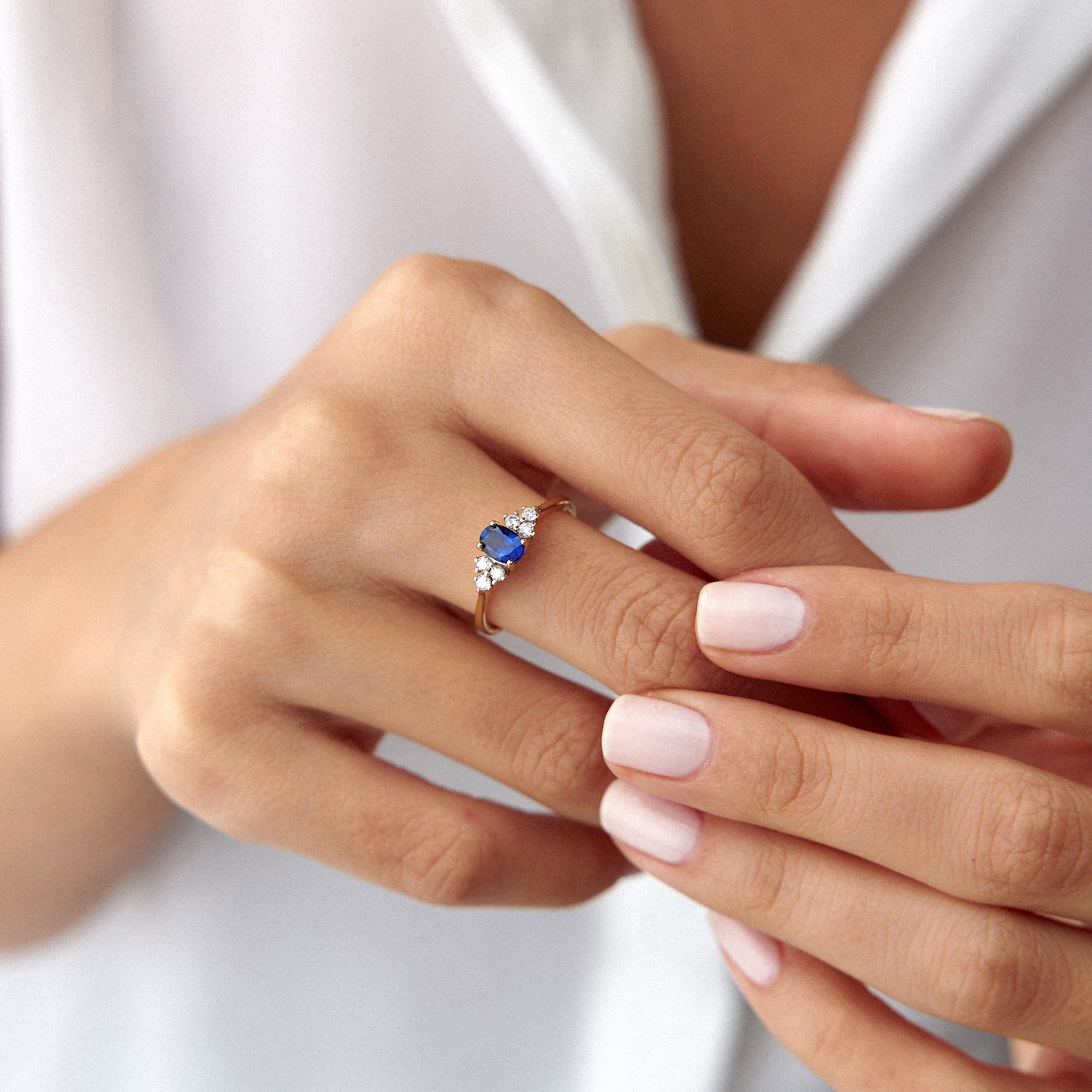 Oval Sapphire and Diamond Ring in 14K Gold