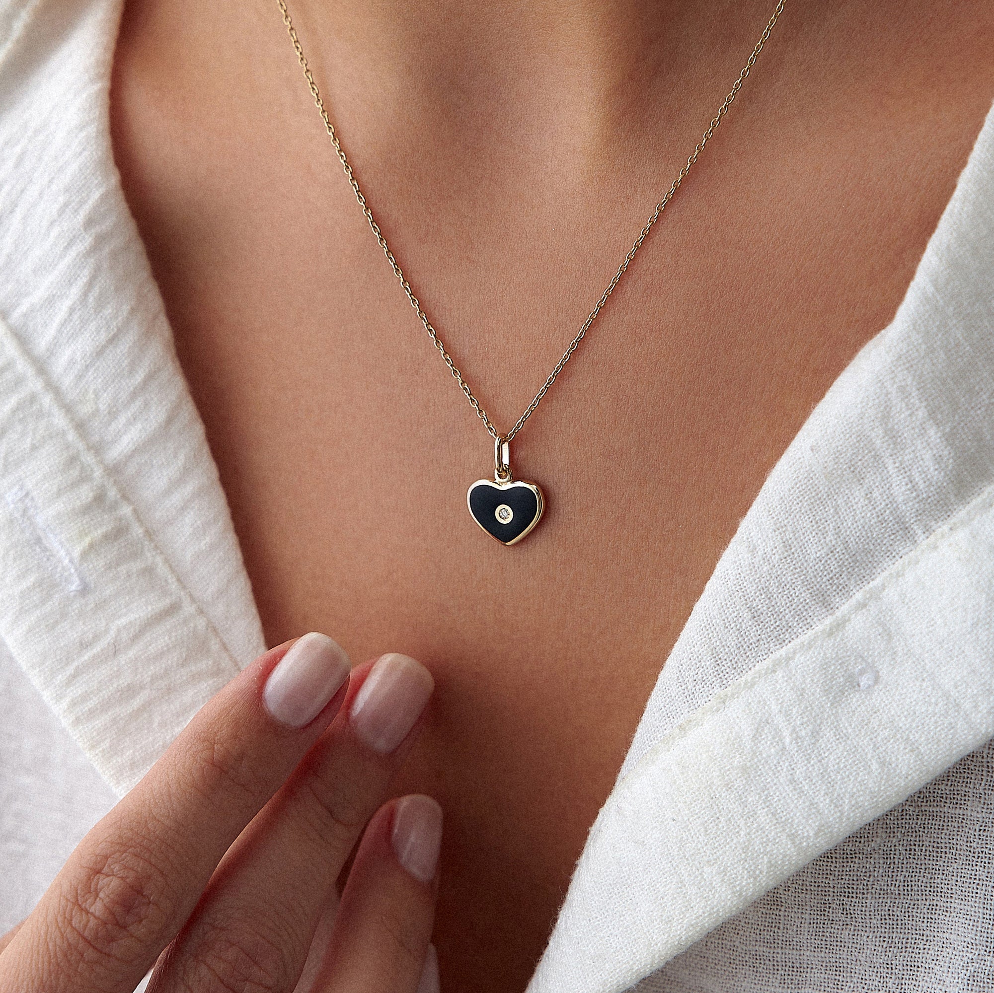 Mini Inlaid Diamond Black Heart Necklace in 14K Gold