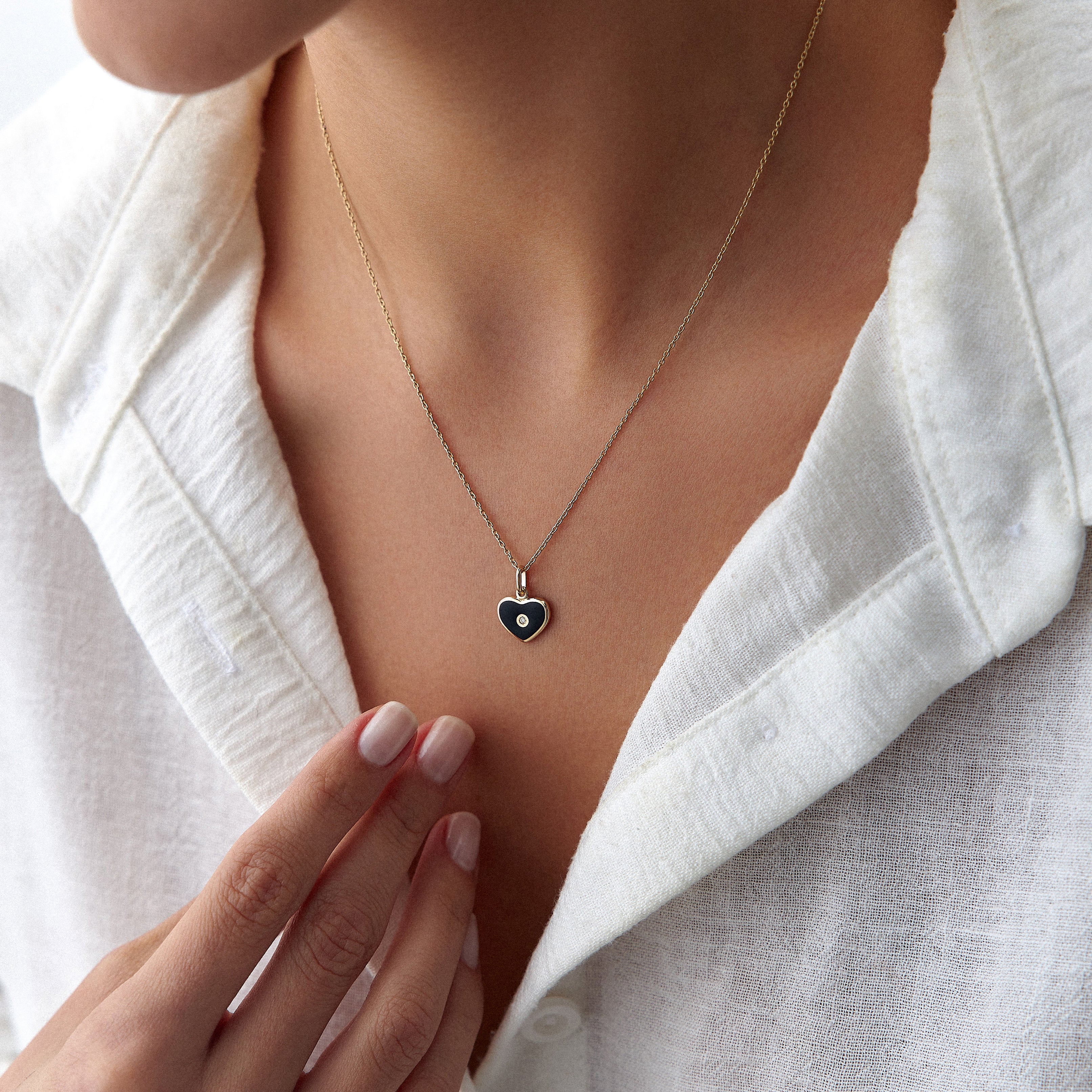 Mini Inlaid Diamond Black Heart Necklace in 14K Gold