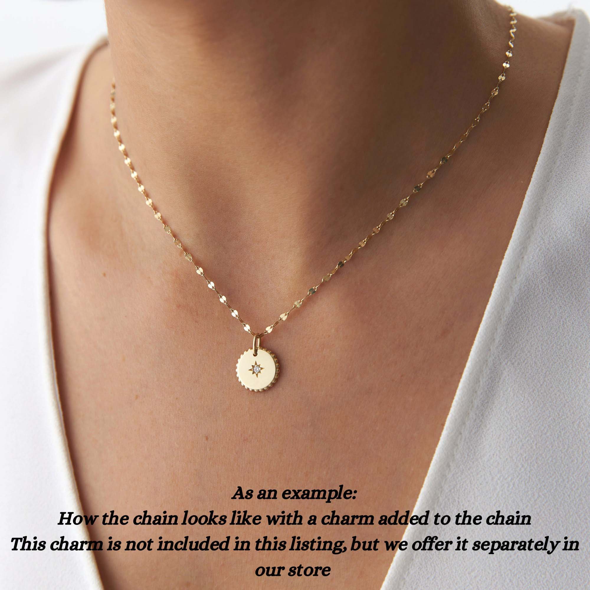 A model demonstrating how the thin italian chain can be worn with a pendant.