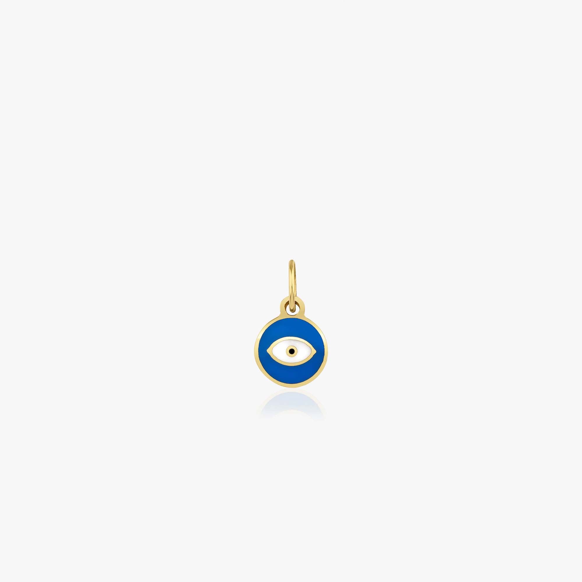A tiny 14k yellow gold pendant with a blue evil eye design on a white background