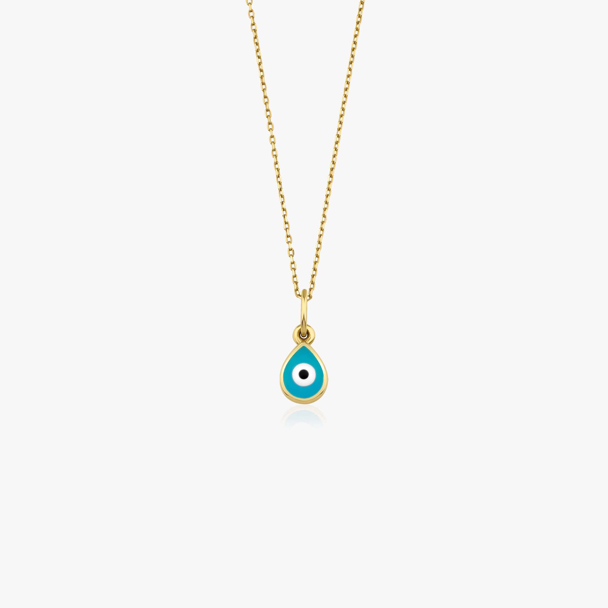 A tiny 14k yellow gold turquoise raindrop necklace with a thin gold chain shown on a white background