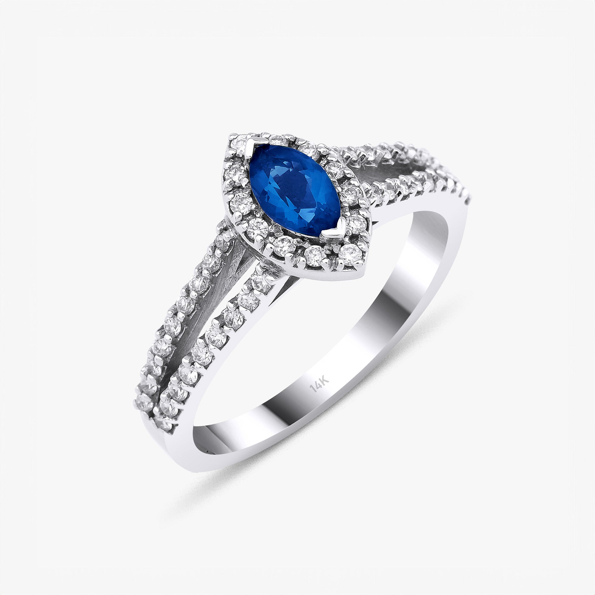Natural Marquise Blue Sapphire and Diamond Ring in 18K Gold