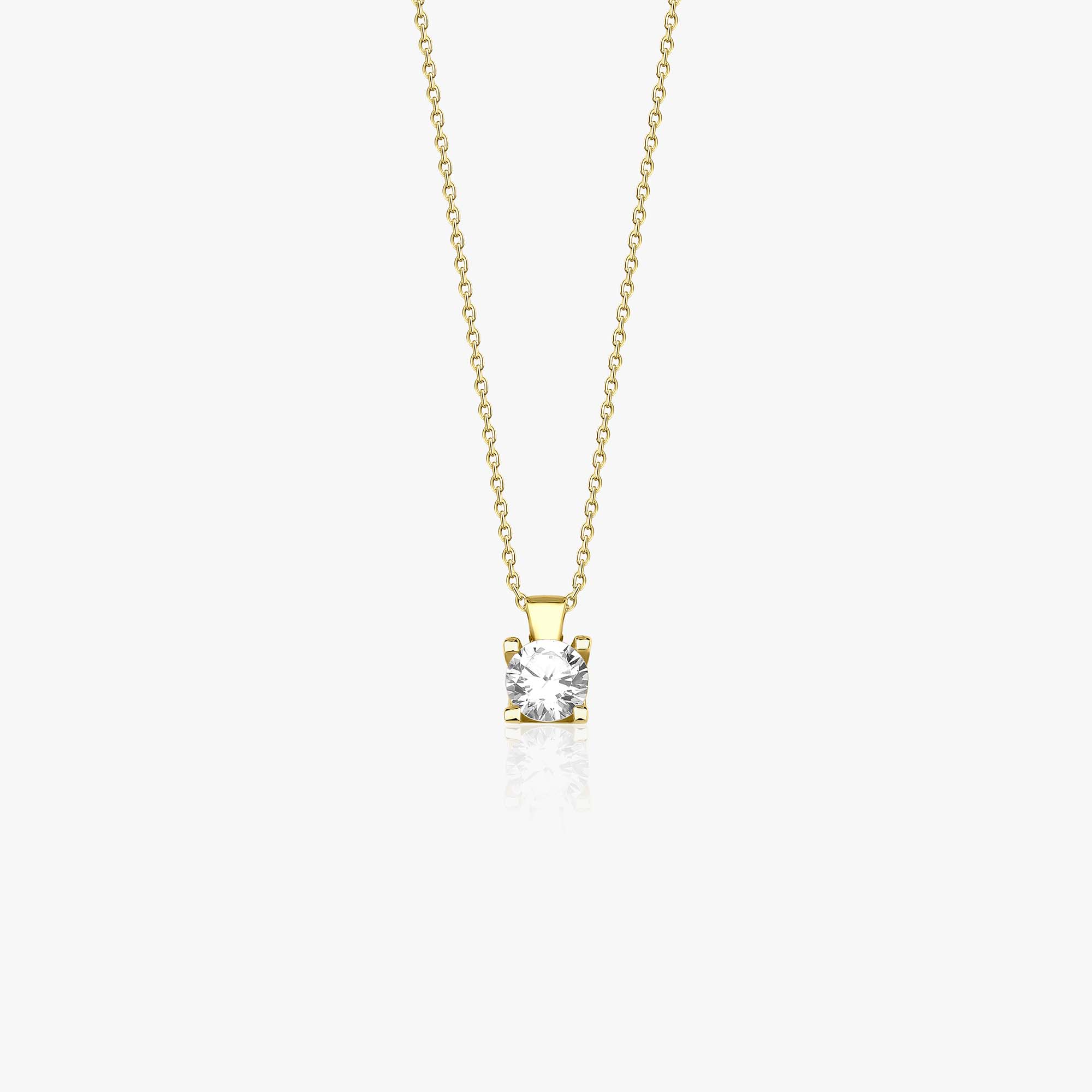A 14k yellow gold solitaire necklace with a four prong setting and a cubic zirconia center stone shown on a white background.