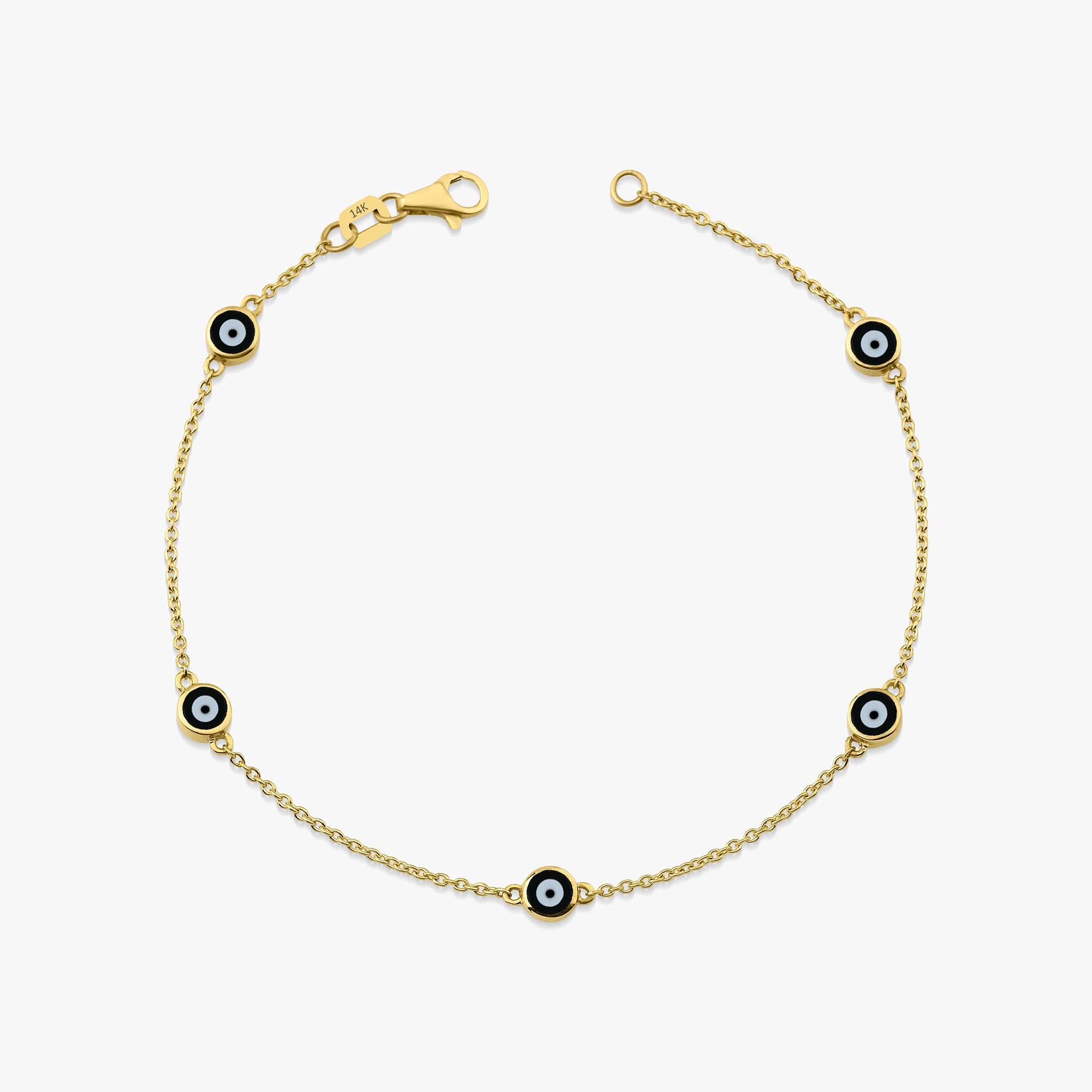 14K yellow gold evil eye bracelet with 5 black evil eyes shown on a white background