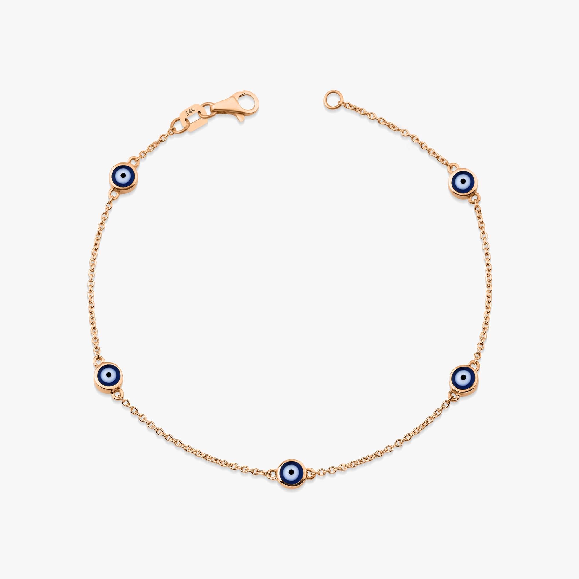14k rose gold navy blue evil eye bracelet with 5 evil eyes shown on a white background