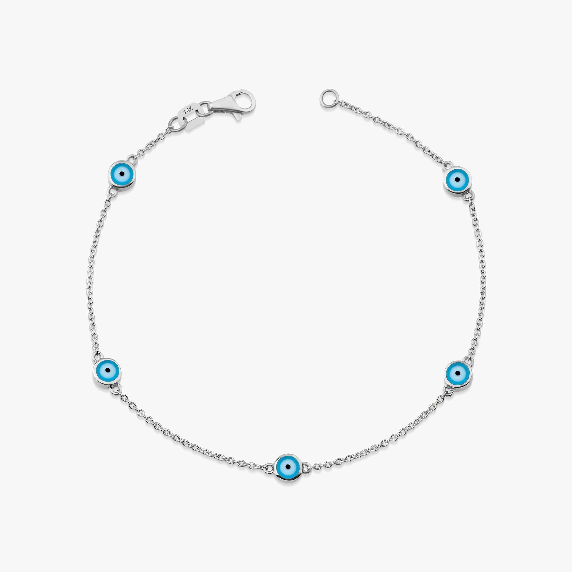 14k white gold ocean blue evil eye bracelet with 5 evil eyes on a wrist
