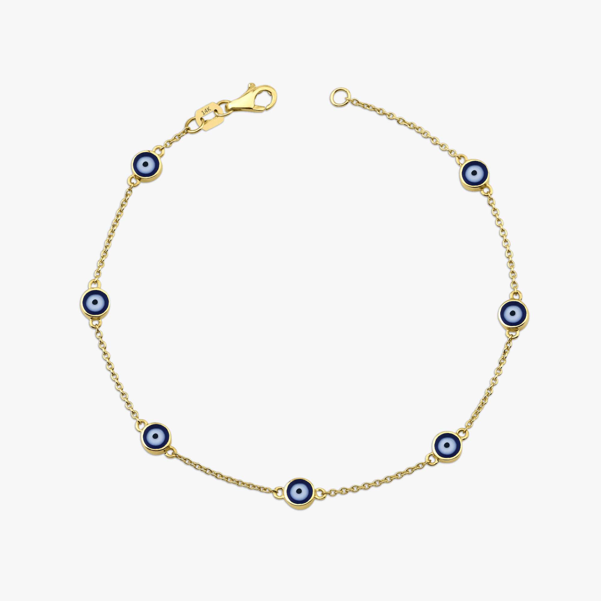 14k yellow gold navy blue evil eye bracelet with 7 evil eyes shown on a white background