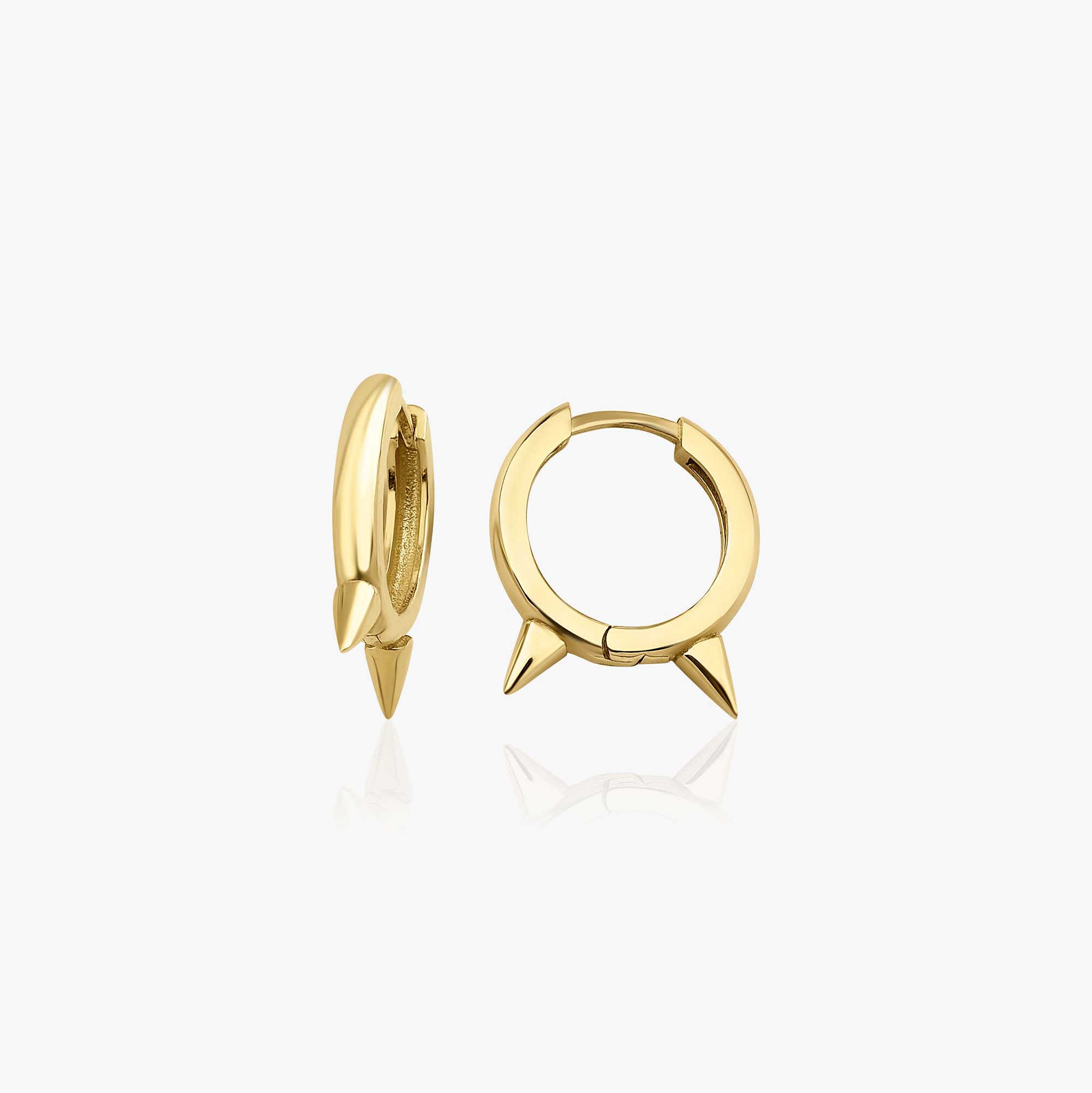 A pair of 14k yellow gold mini spike hoops shown on a white background.