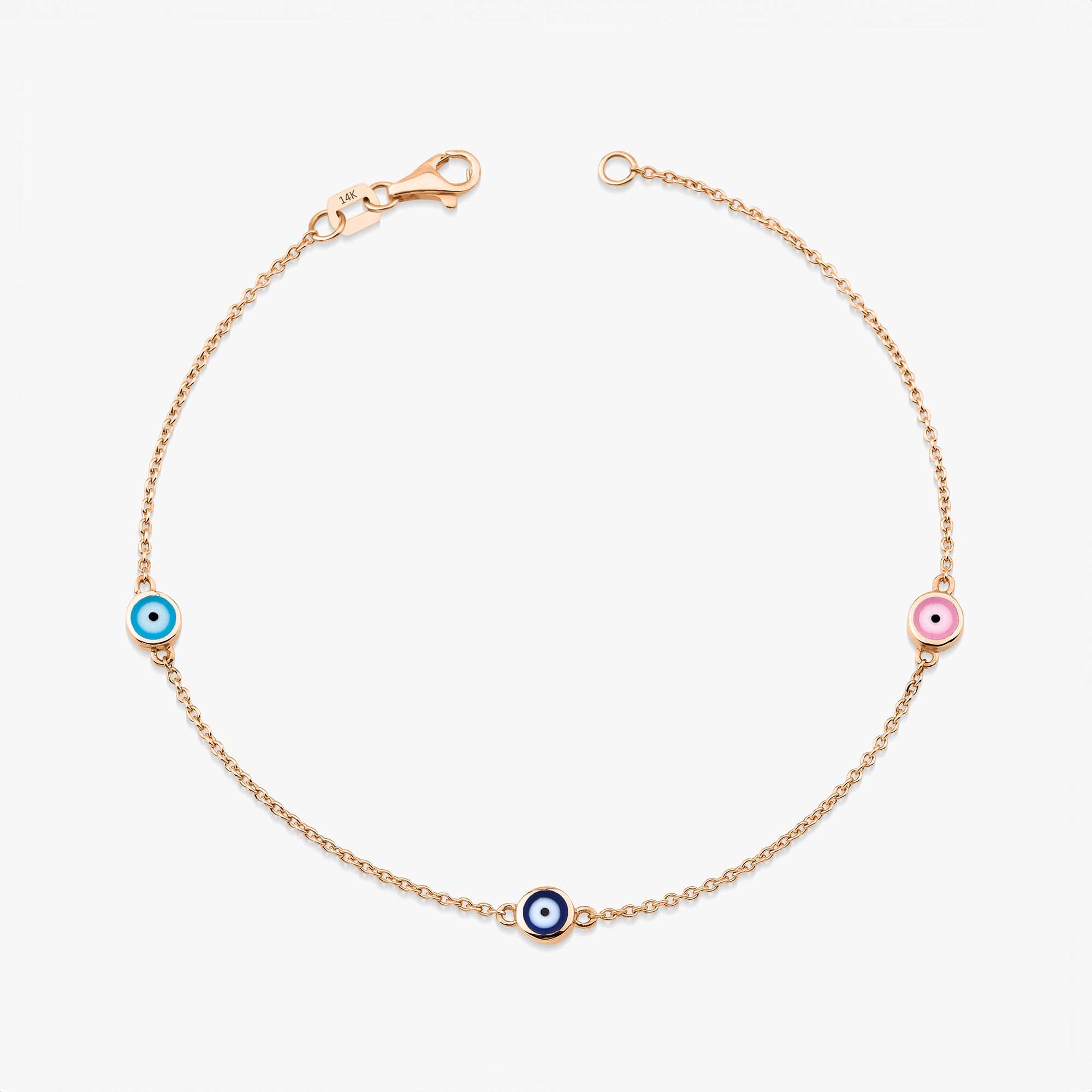 14 karat rose gold multicolor evil eye bracelet with three evil eyes on a white background