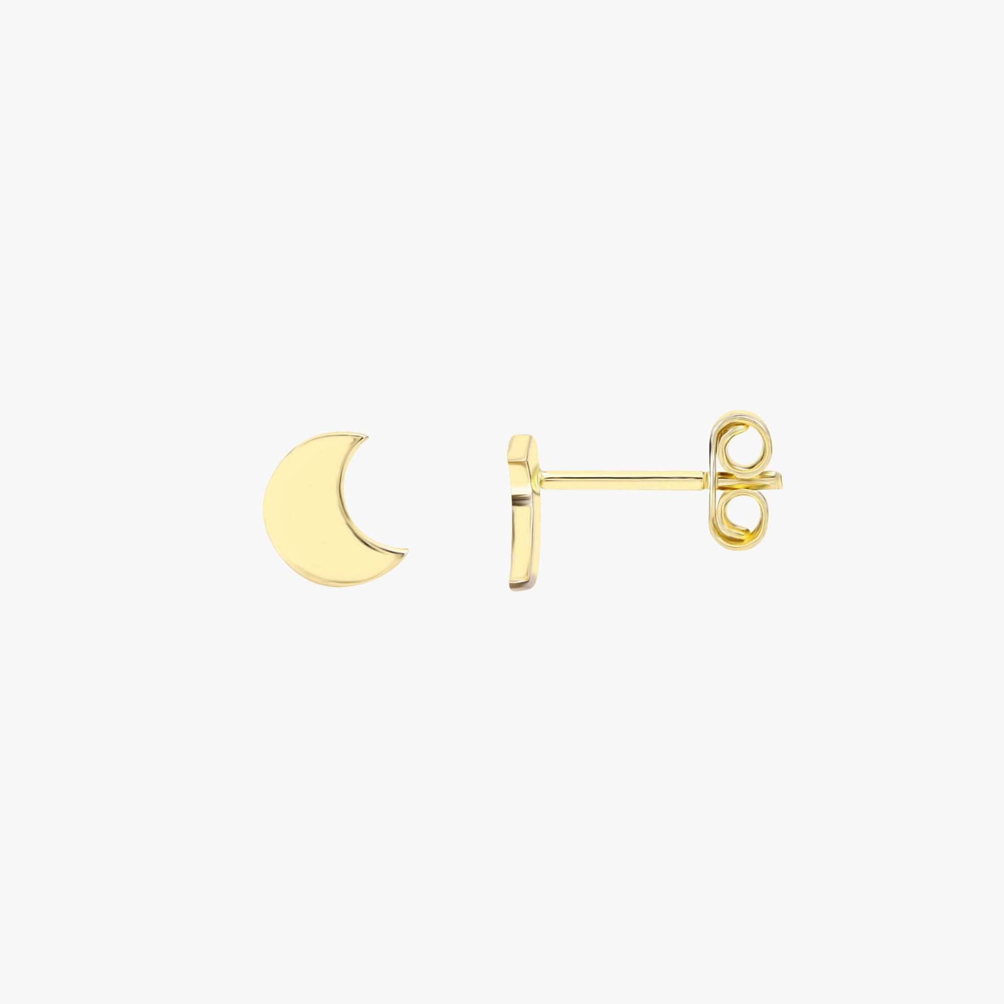 Sideview of a mini crescent moon stud on a white background
