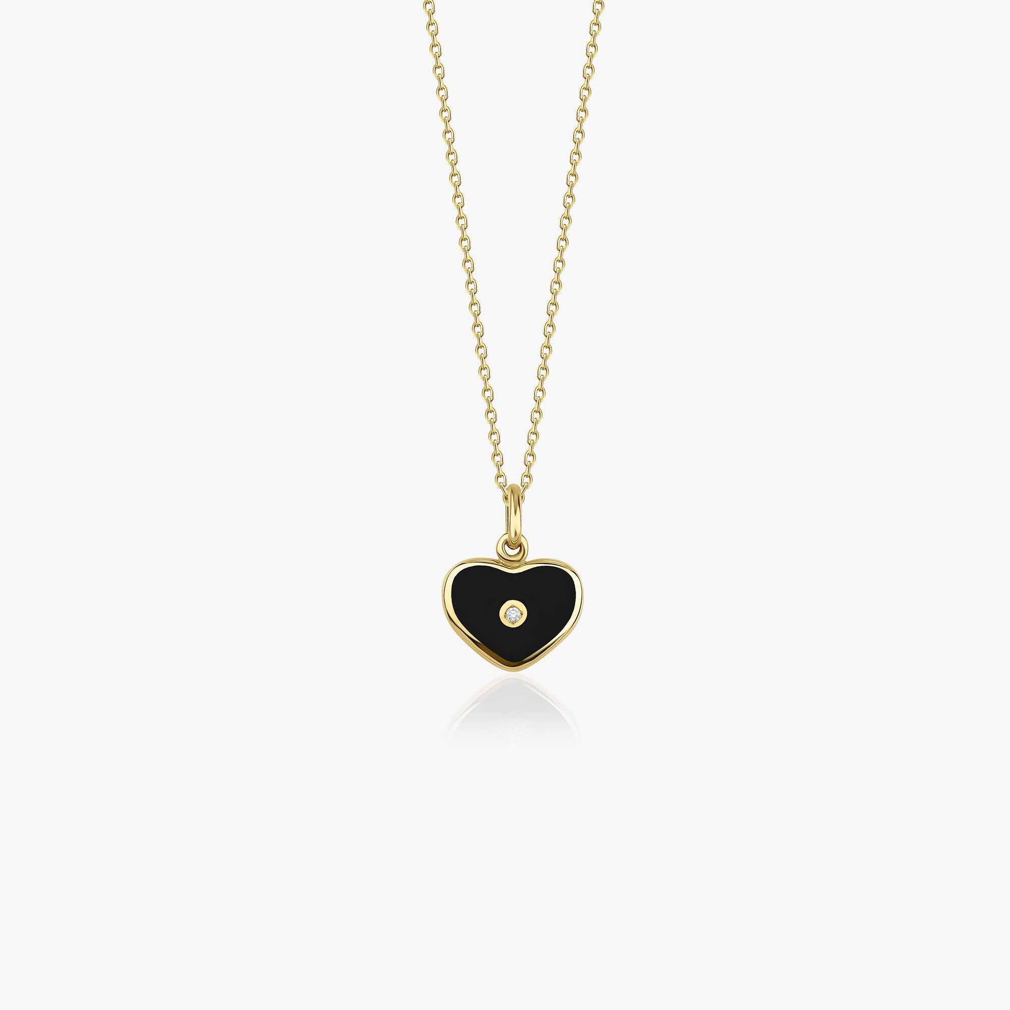 A 14K gold necklace featuring a dainty black heart-shaped pendant with a central inlaid natural diamond.