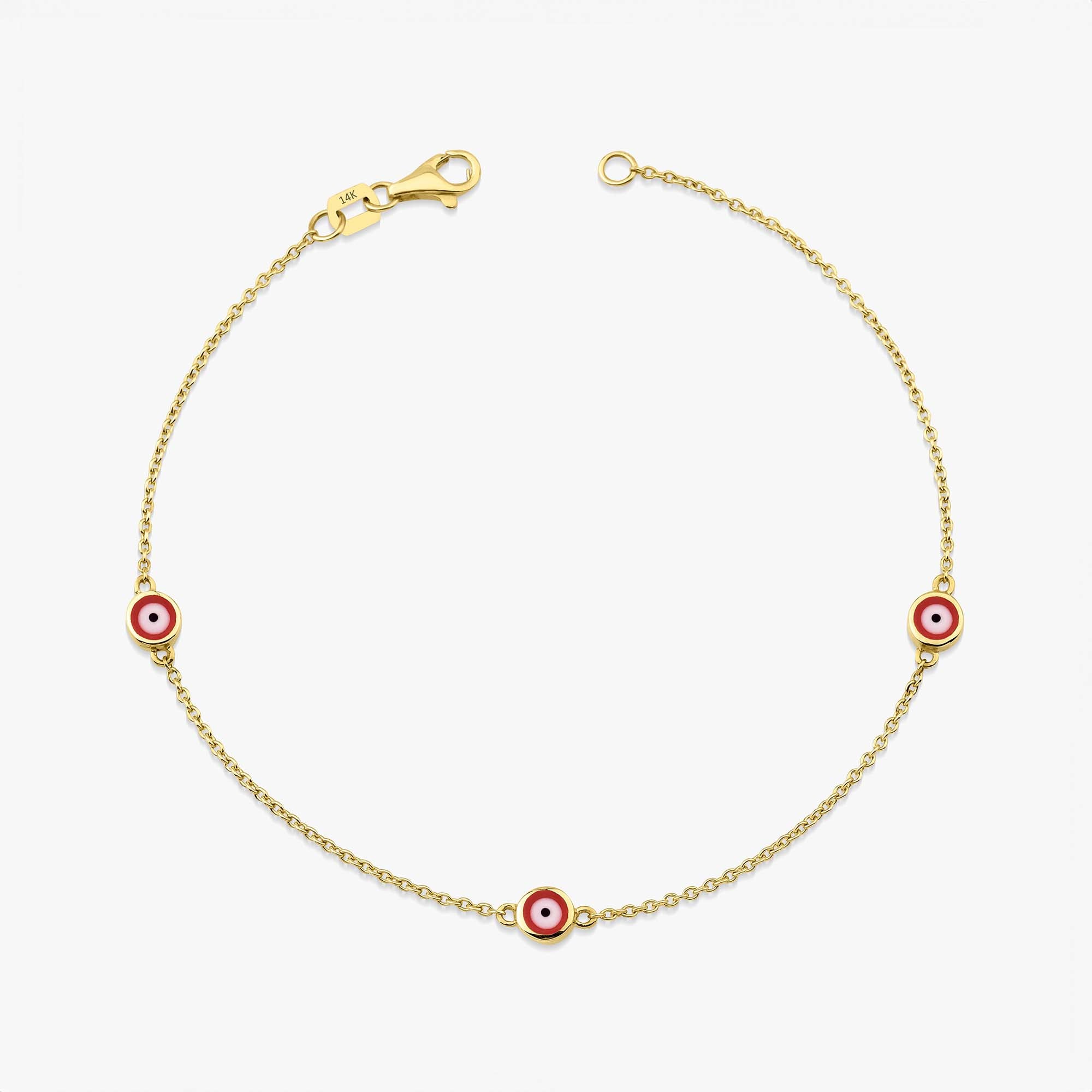 14 karat yellow gold three red evil eye bracelet with lobster clasp on a white background