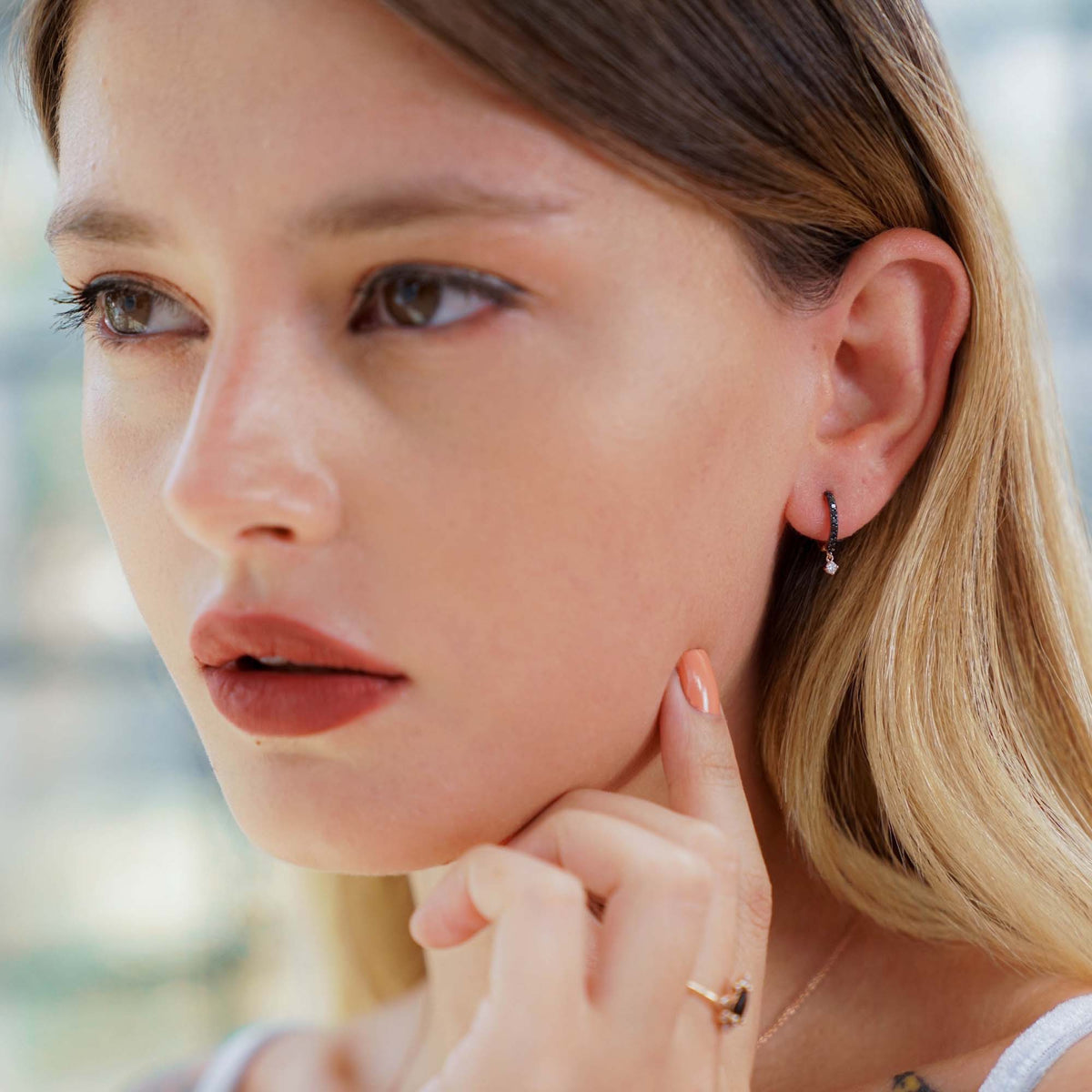 Single Minimal Black Diamond Dangle Hoop in 14K Gold