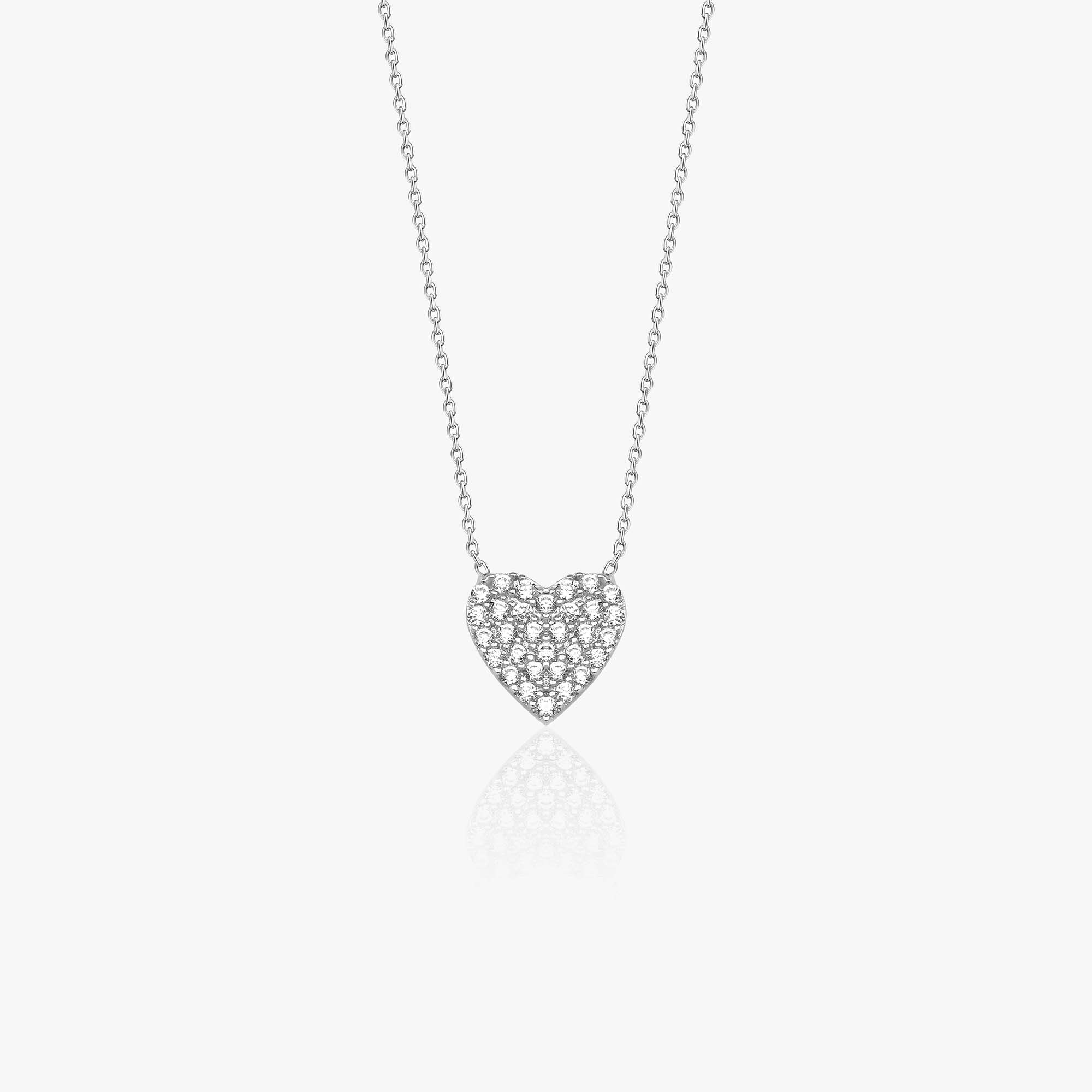 14k white gold necklace with a pave set heart-shaped pendant on a white background