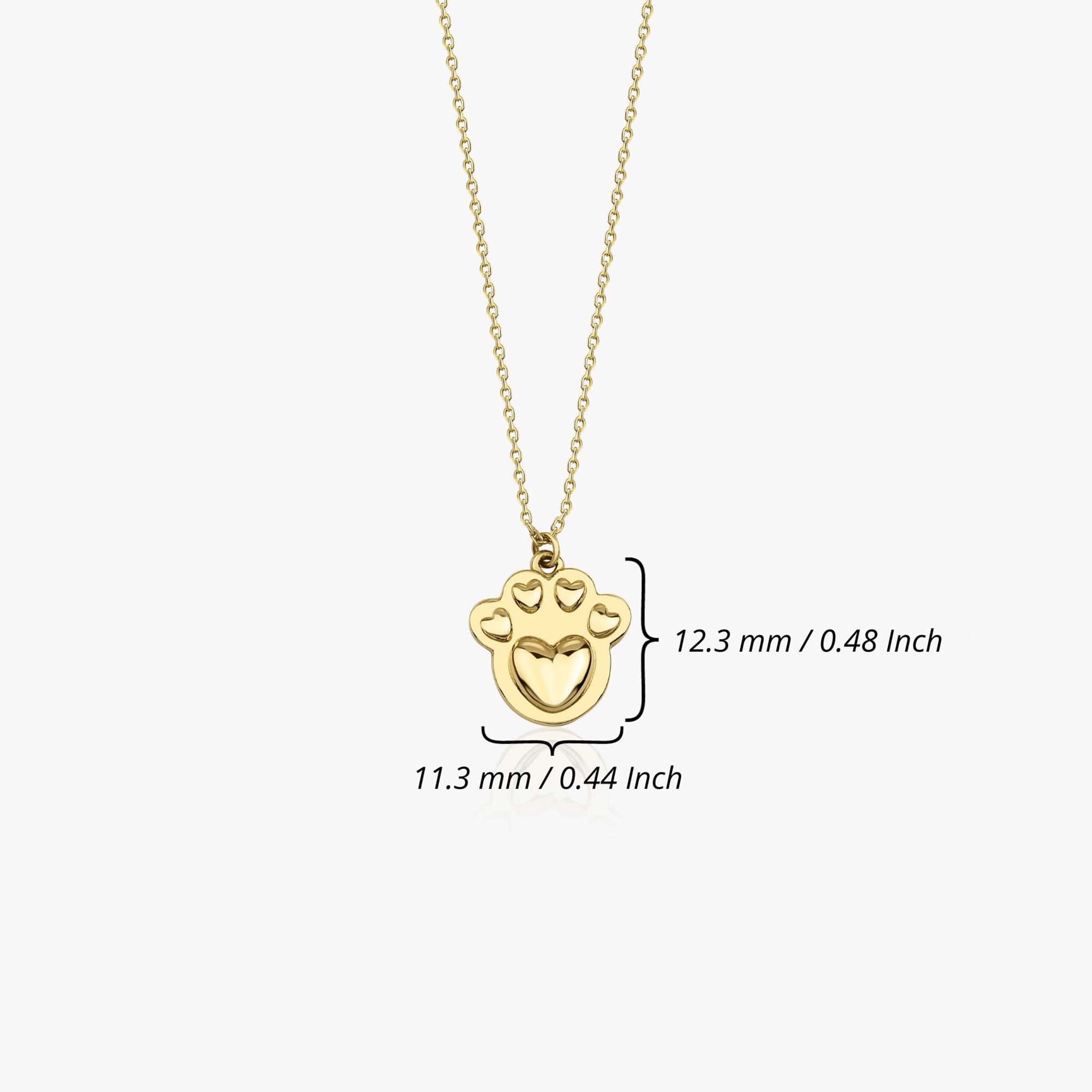 A paw necklace shown on a white background with measurements