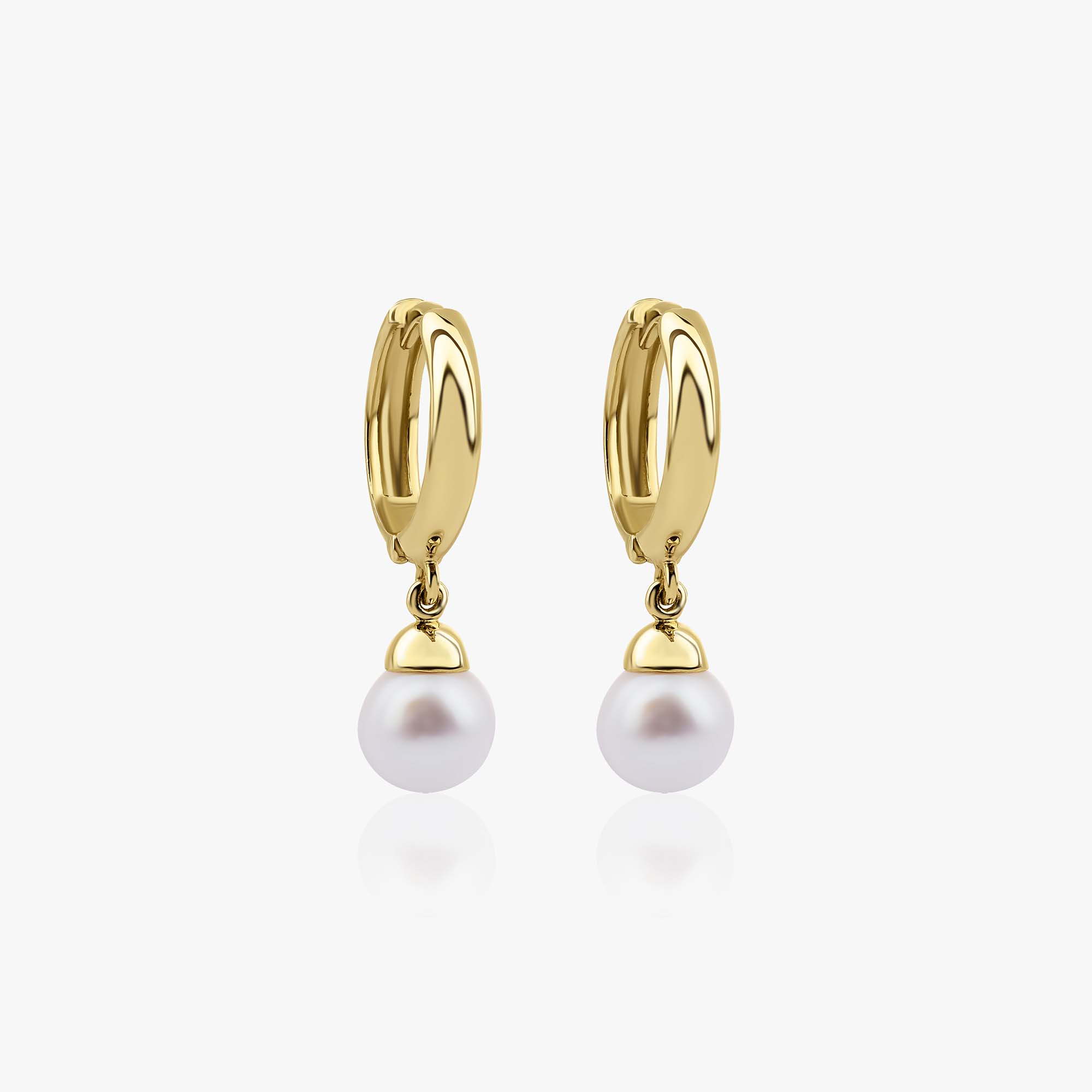14K yellow gold hoops with pearl drops on a white background