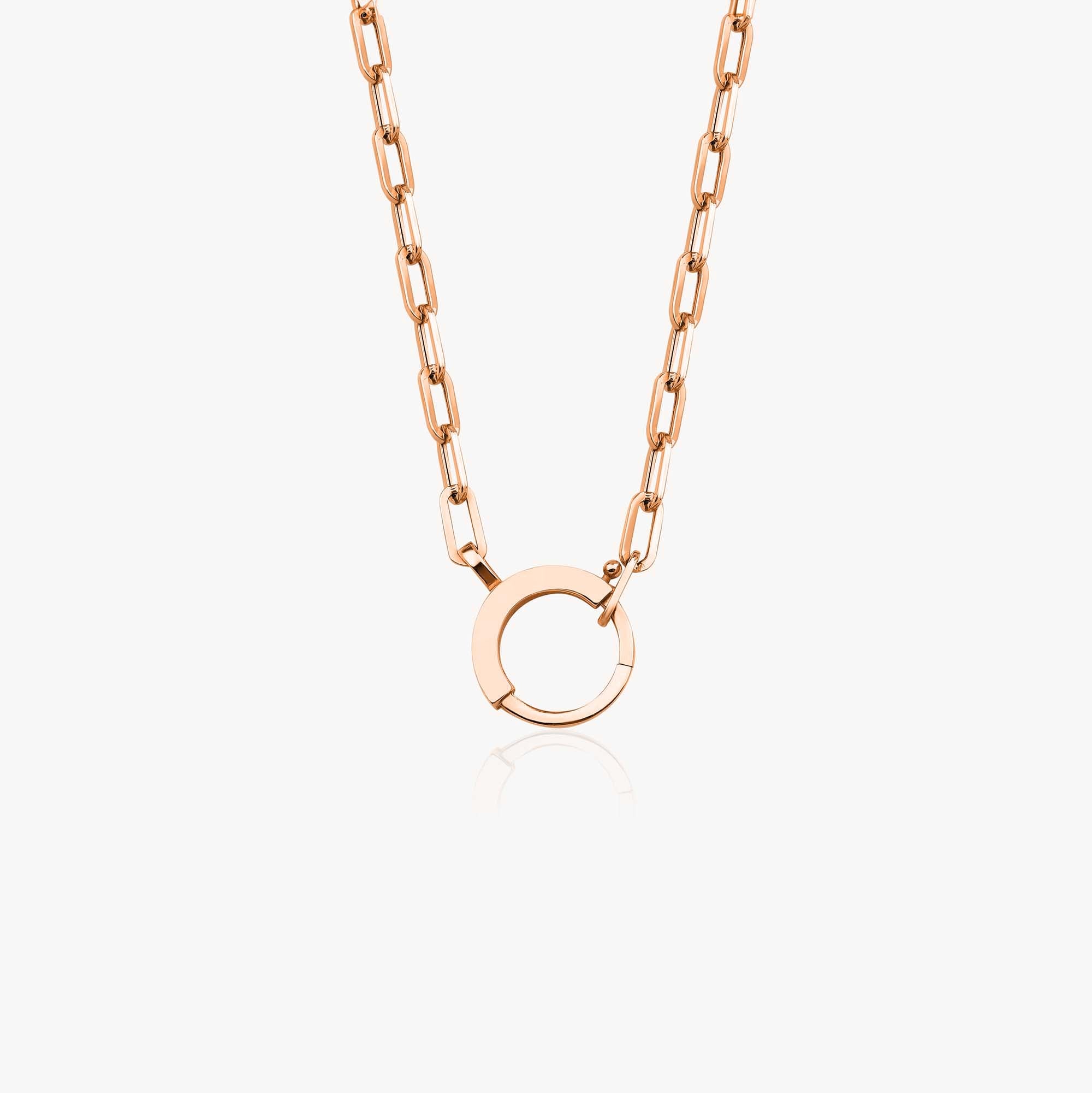 A 14K rose gold paperclip chain necklace with a charm holder lock mechanism, displayed against a white background.