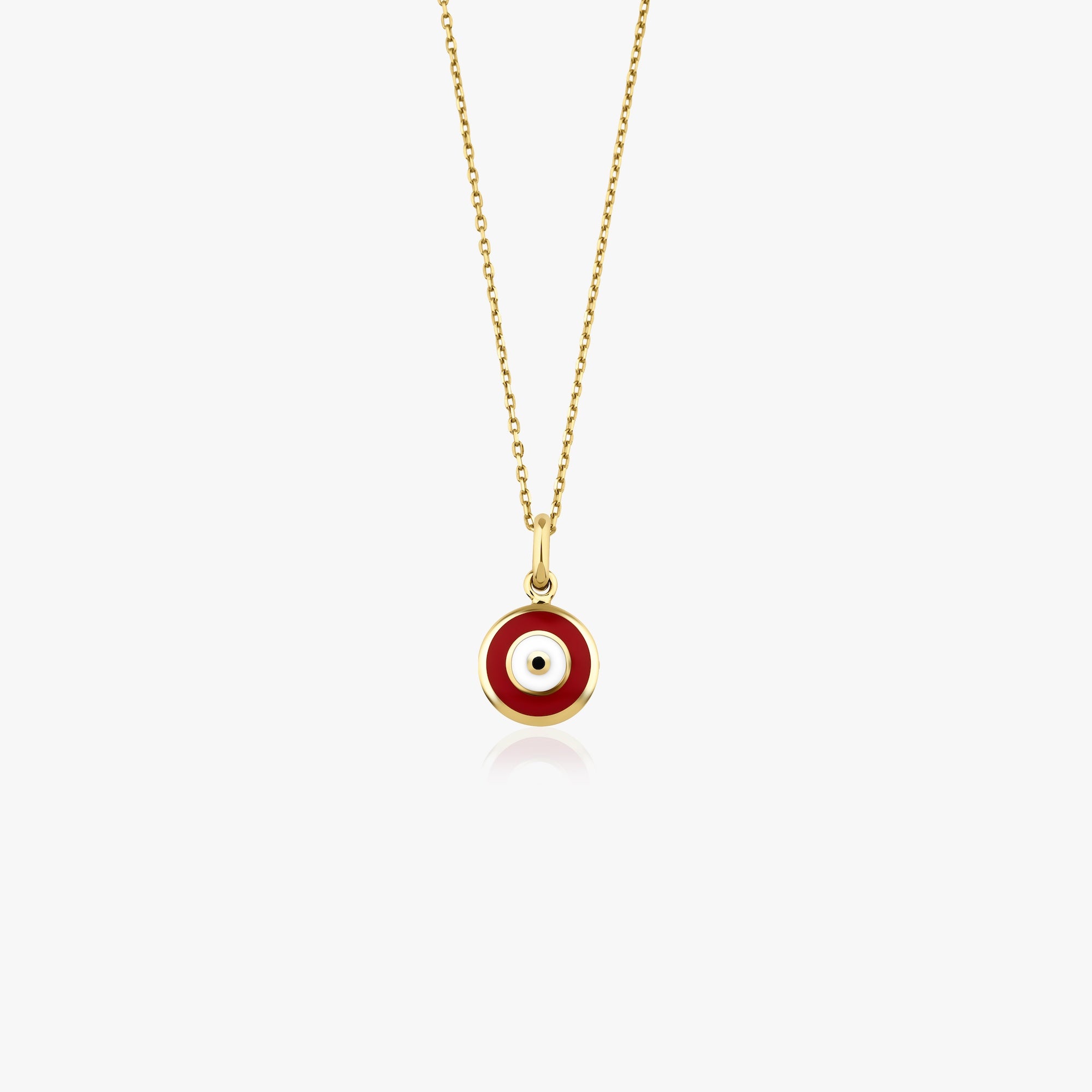A 14k yellow gold red evil eye necklace shown on a white background