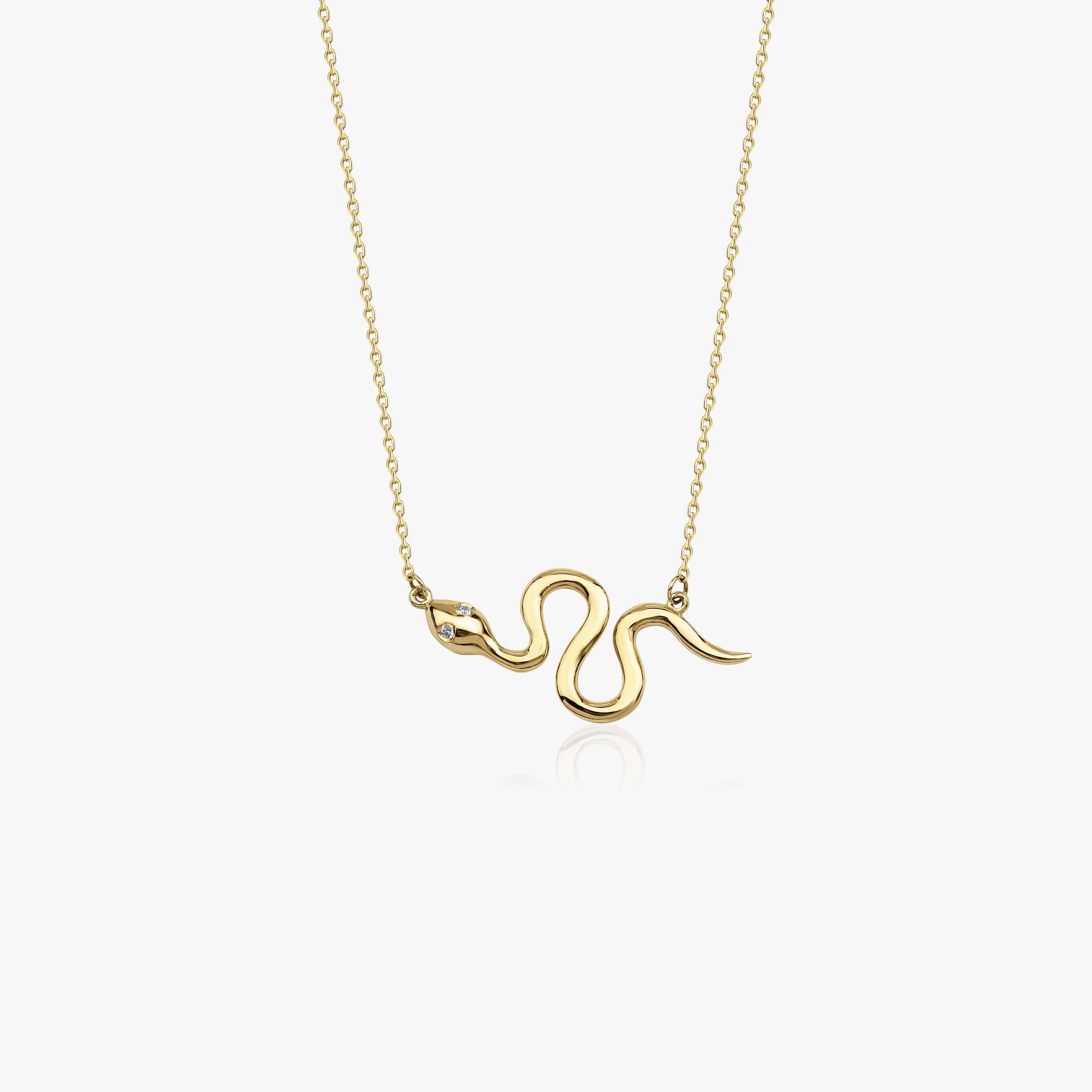 14k gold snake-shaped pendant necklace on a white background