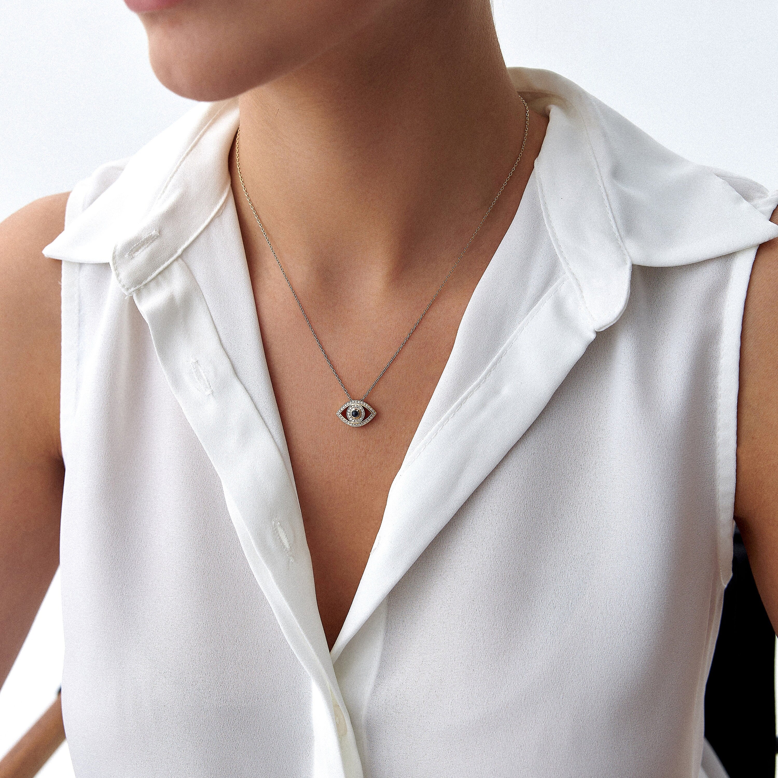 Blue Sapphire and Diamond Evil Eye Necklace