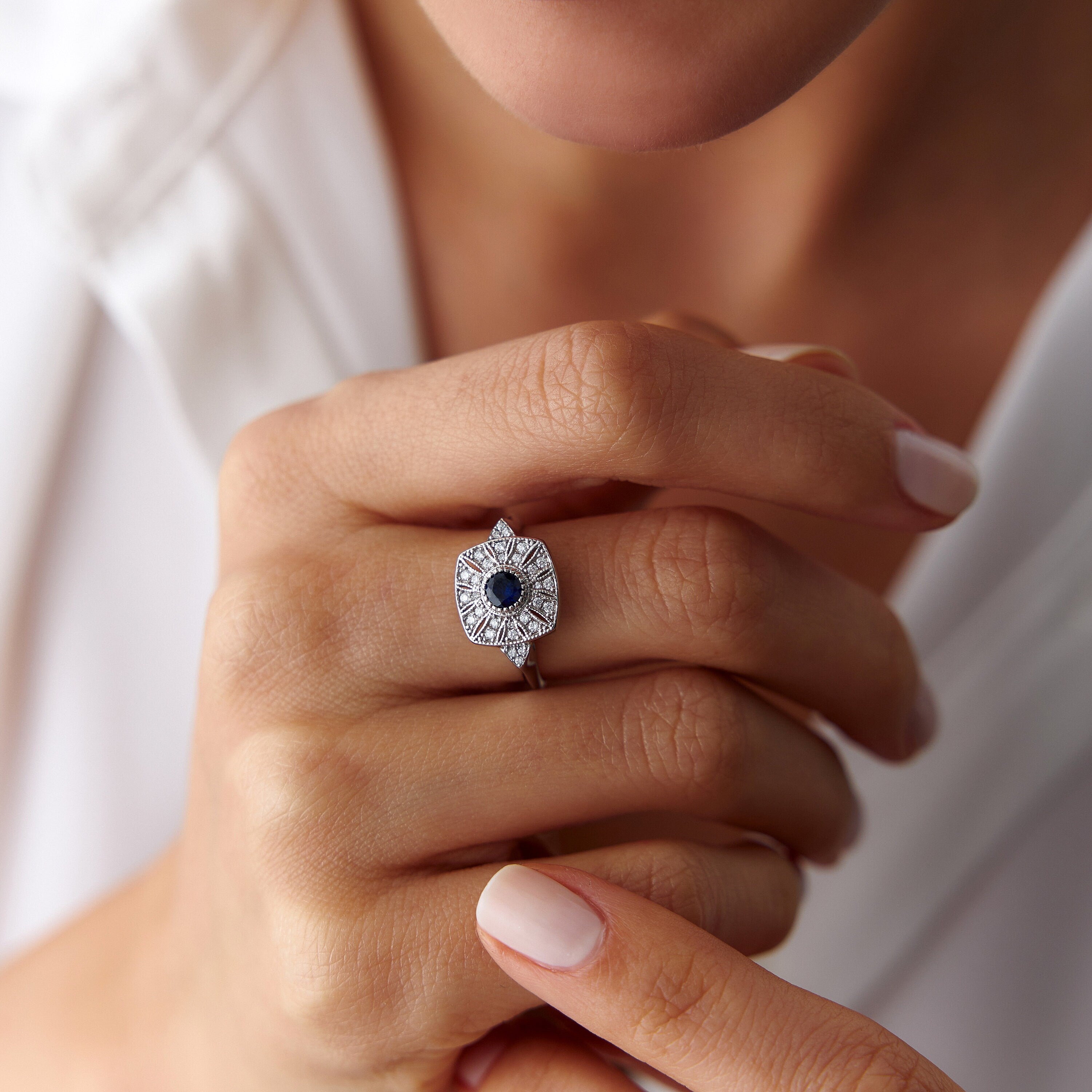 Round Cut Sapphire and Diamond Ring in 14K Gold
