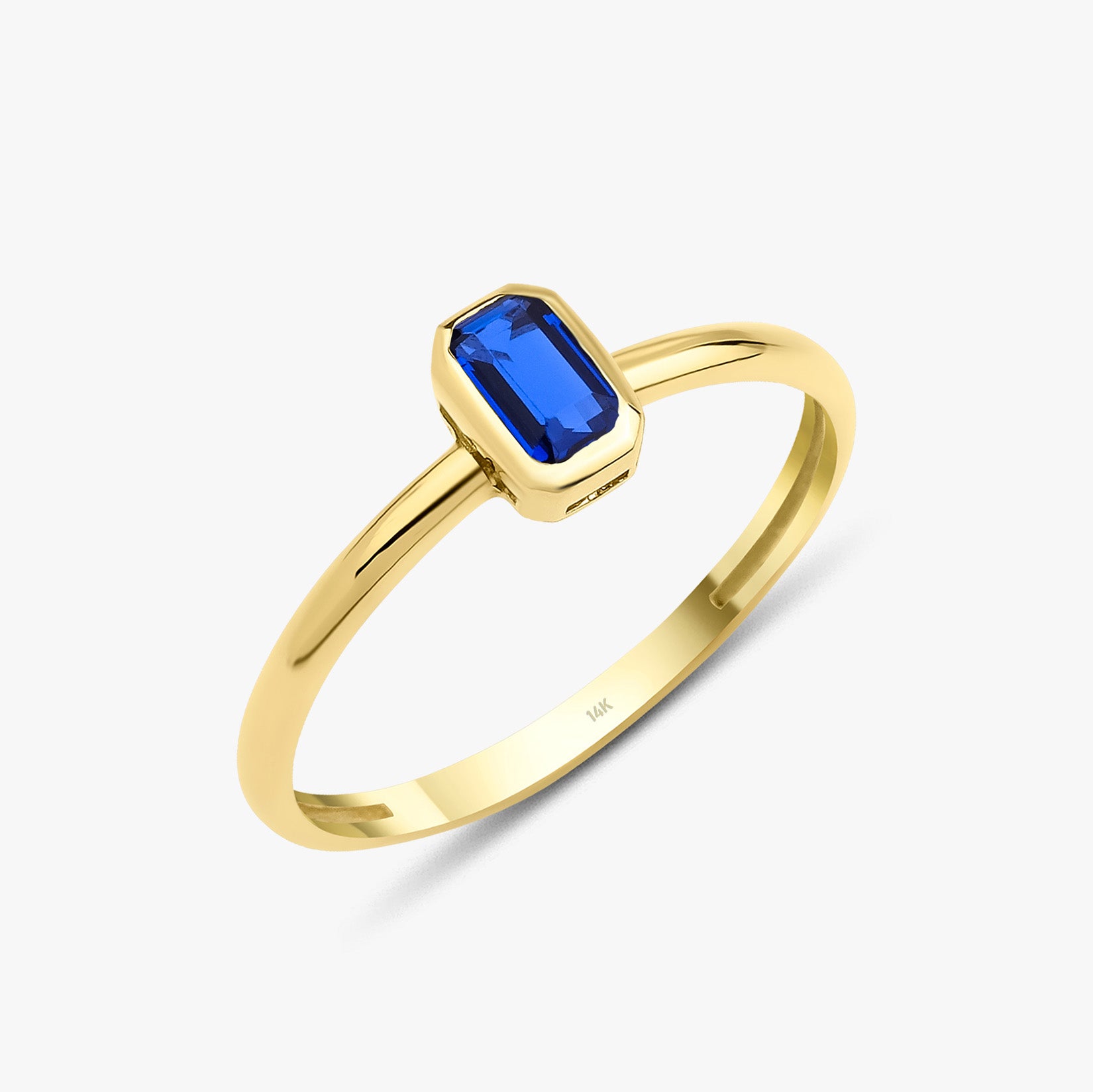 Emerald Cut Blue Gemstone Ring in 14K Gold