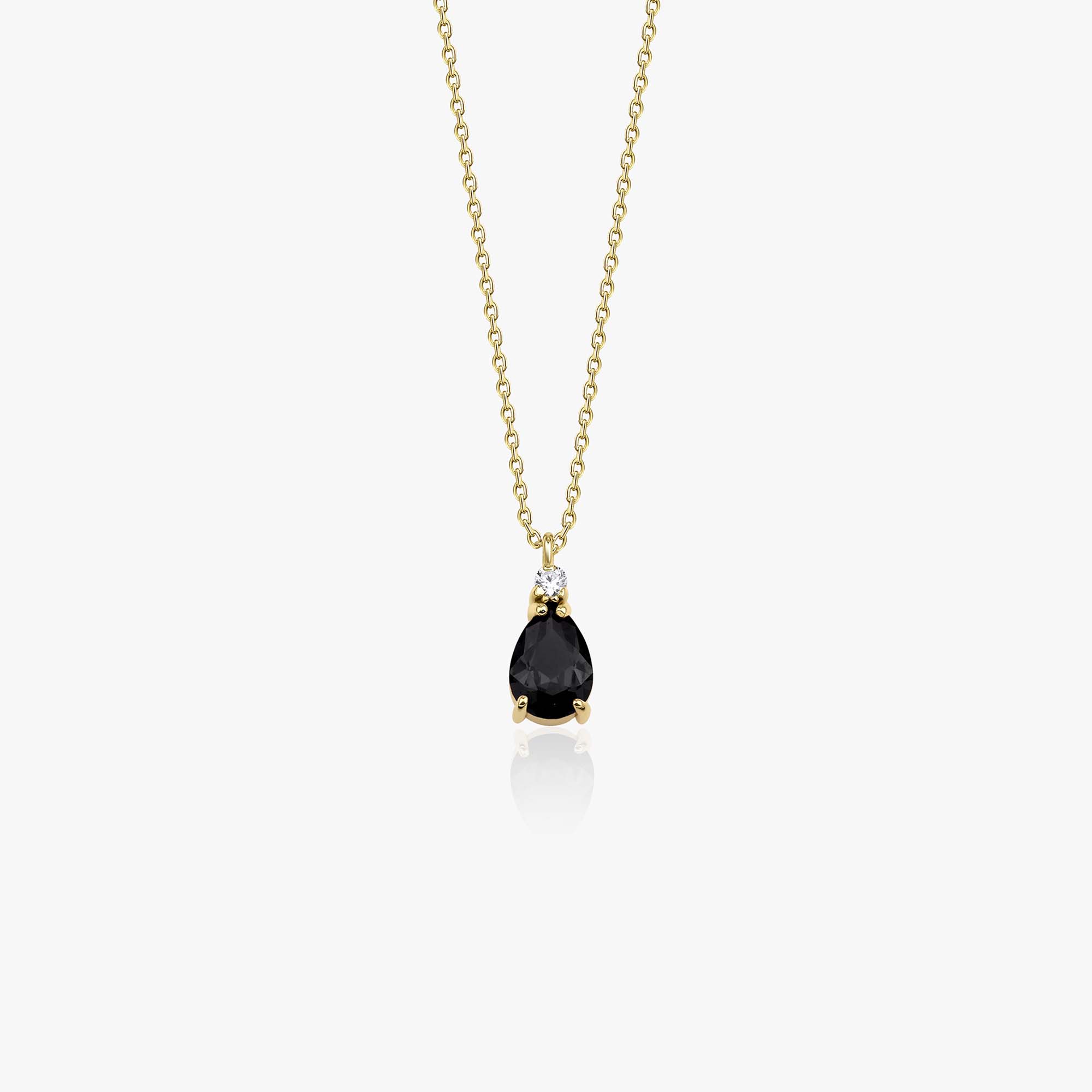 A 14K yellow gold black drop necklace shown on a white background