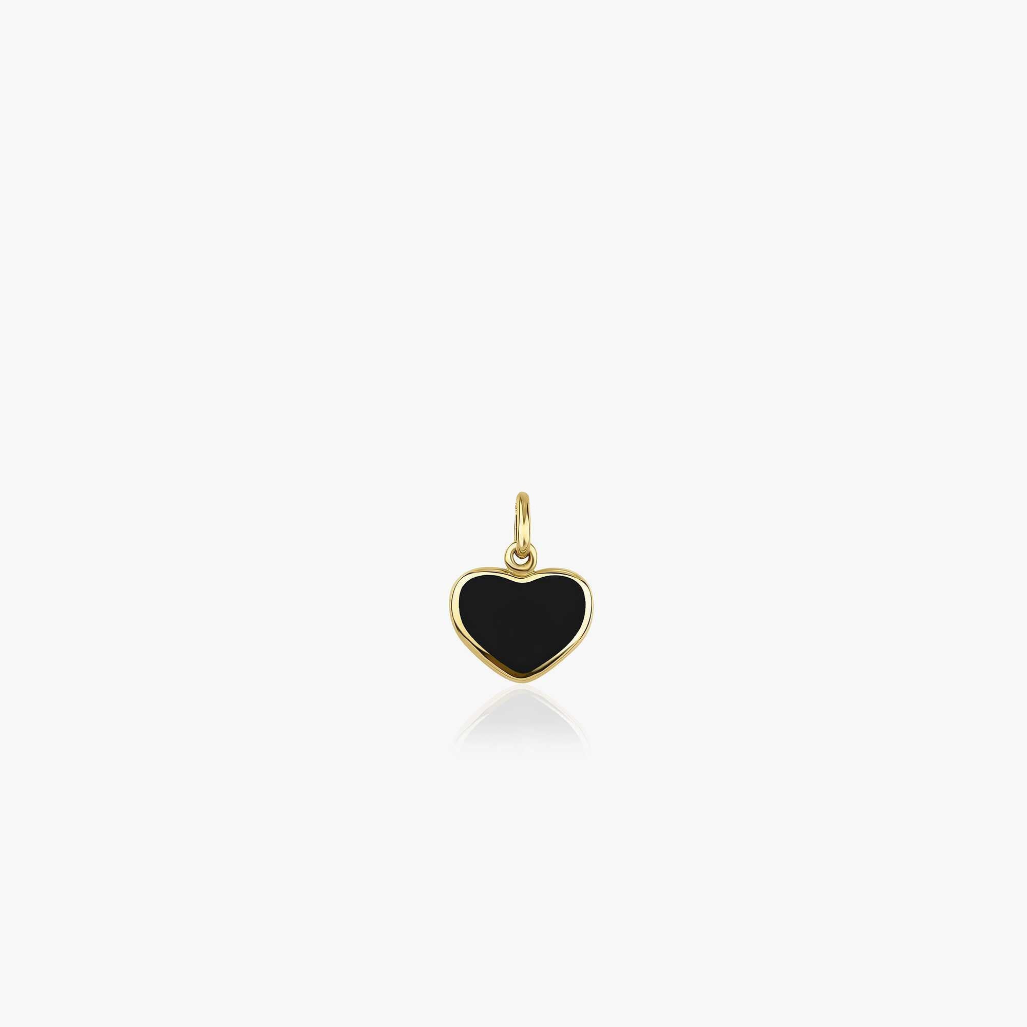 A small black heart-shaped pendant made of 14K gold, displayed against a white background.