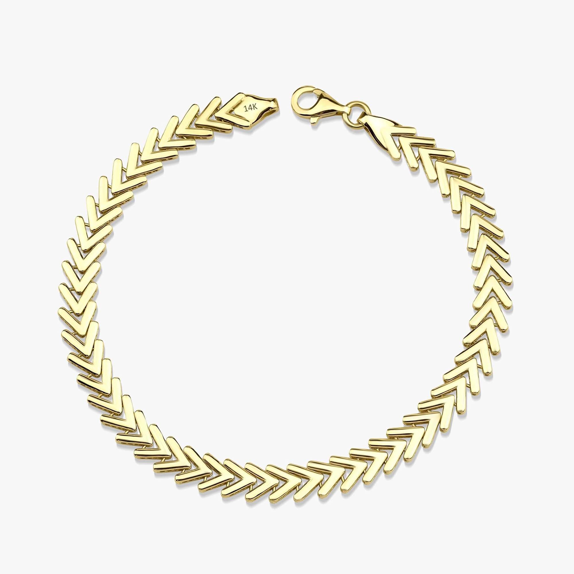 14k yellow gold chevron chain bracelet shown on a white background.