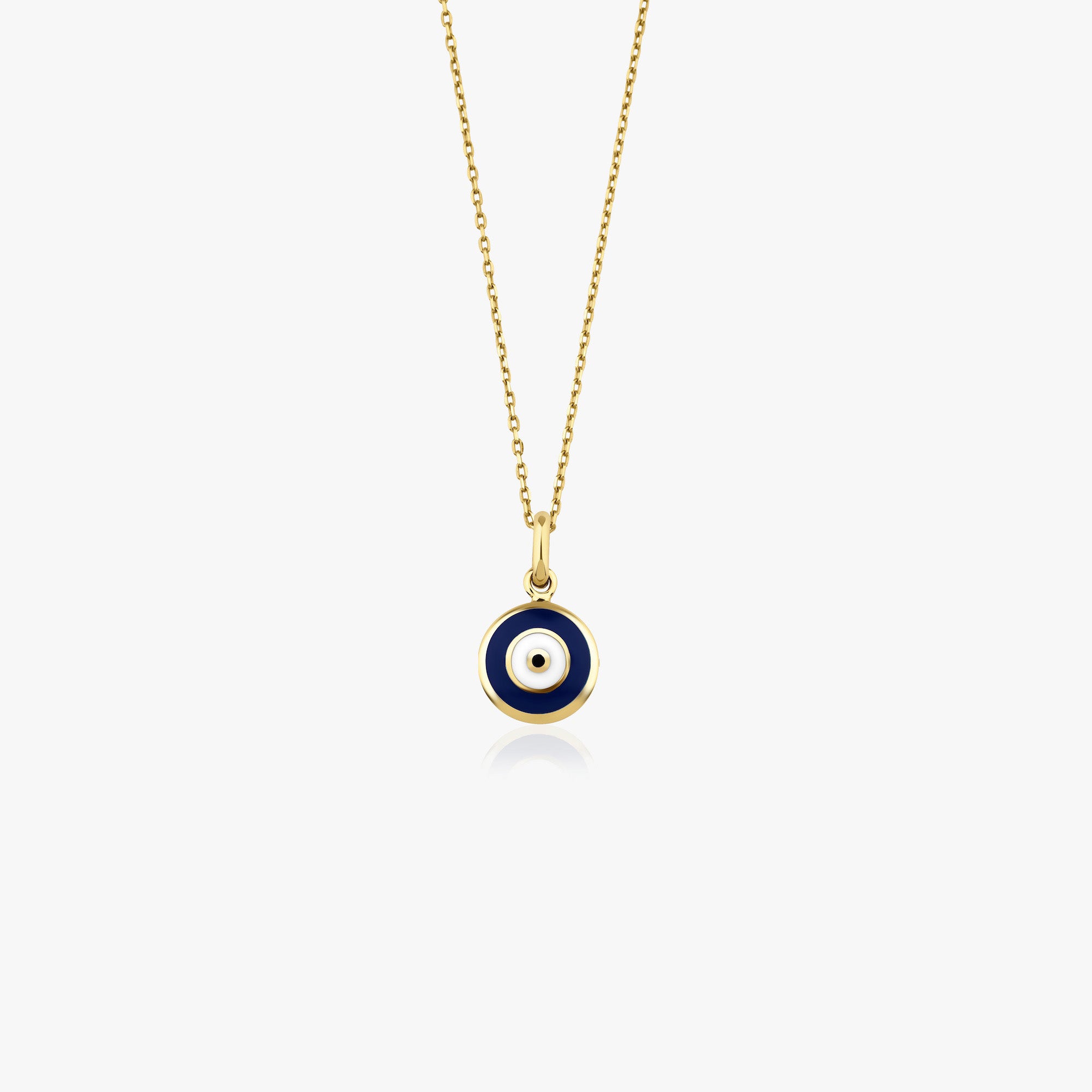 A 14k yellow gold evil eye necklace with a dark blue enamel center shown on a white background.